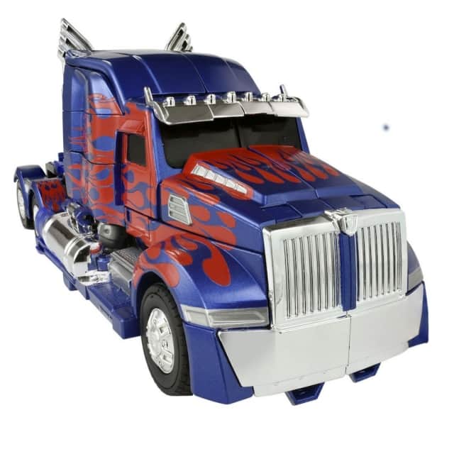 TLK-15 DX Caliber Optimus Prime with Limited Edition Weapon | Transformers the Last Knight Premier Edition