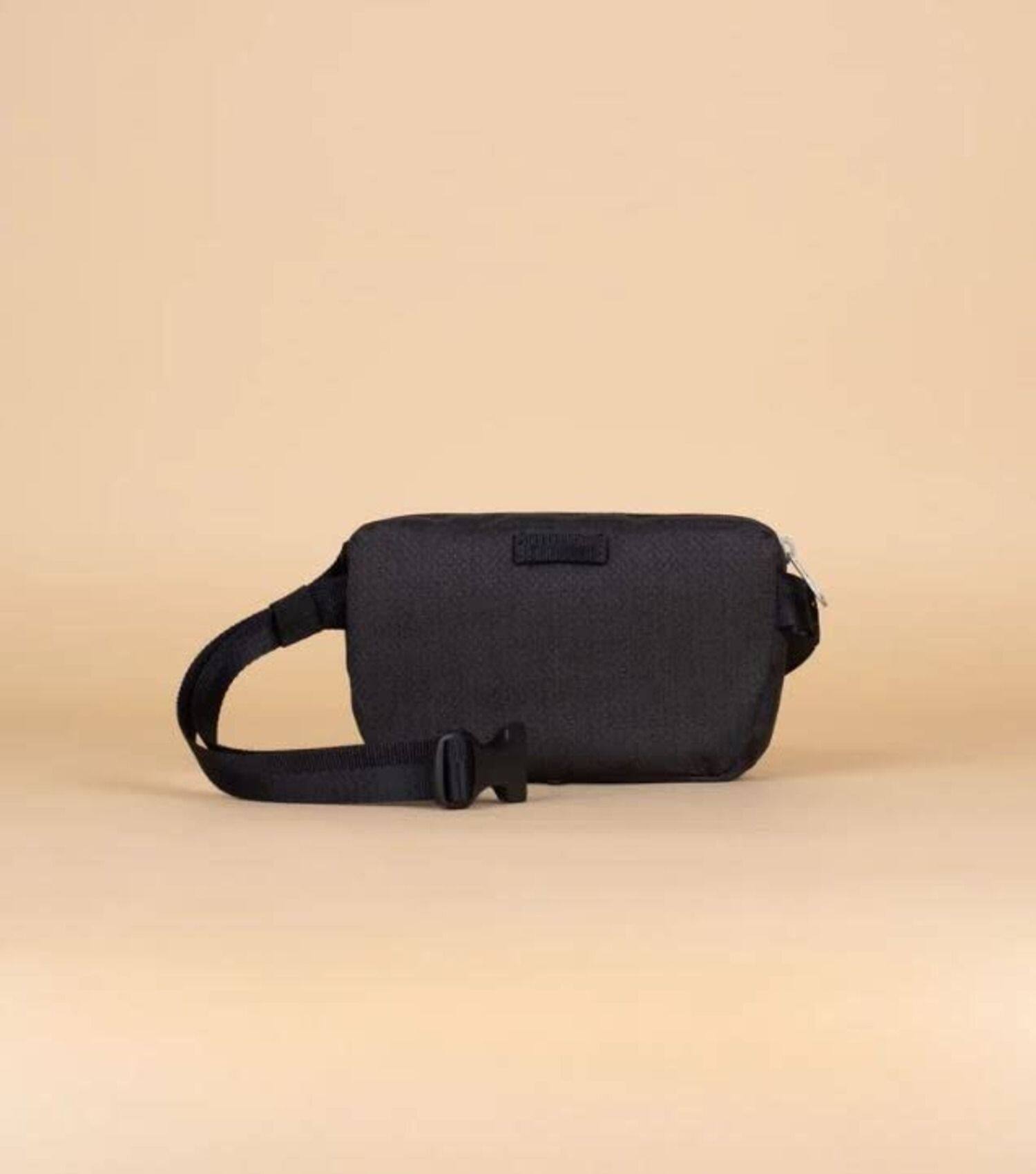 Left. Haiku - Haiku Hopper waistpack or crossbody sling - Black in Bloom.