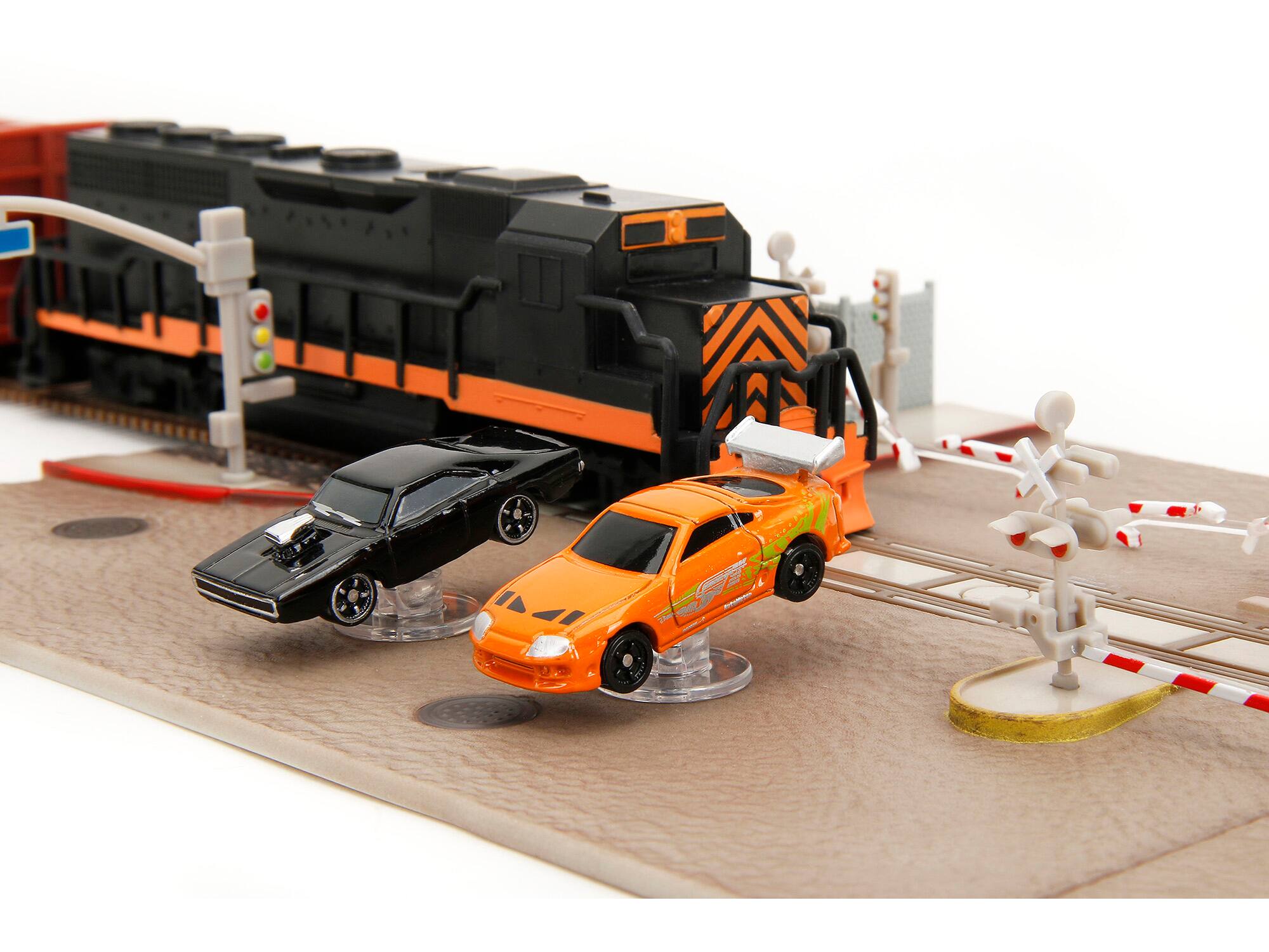 Alt View 1. Jada - "Fast & Furious" Final Race Diorama with Toyota Supra Orange and Dodge Charger Black "Nano Scene" Series model by Jada - Supra Orange And Black.