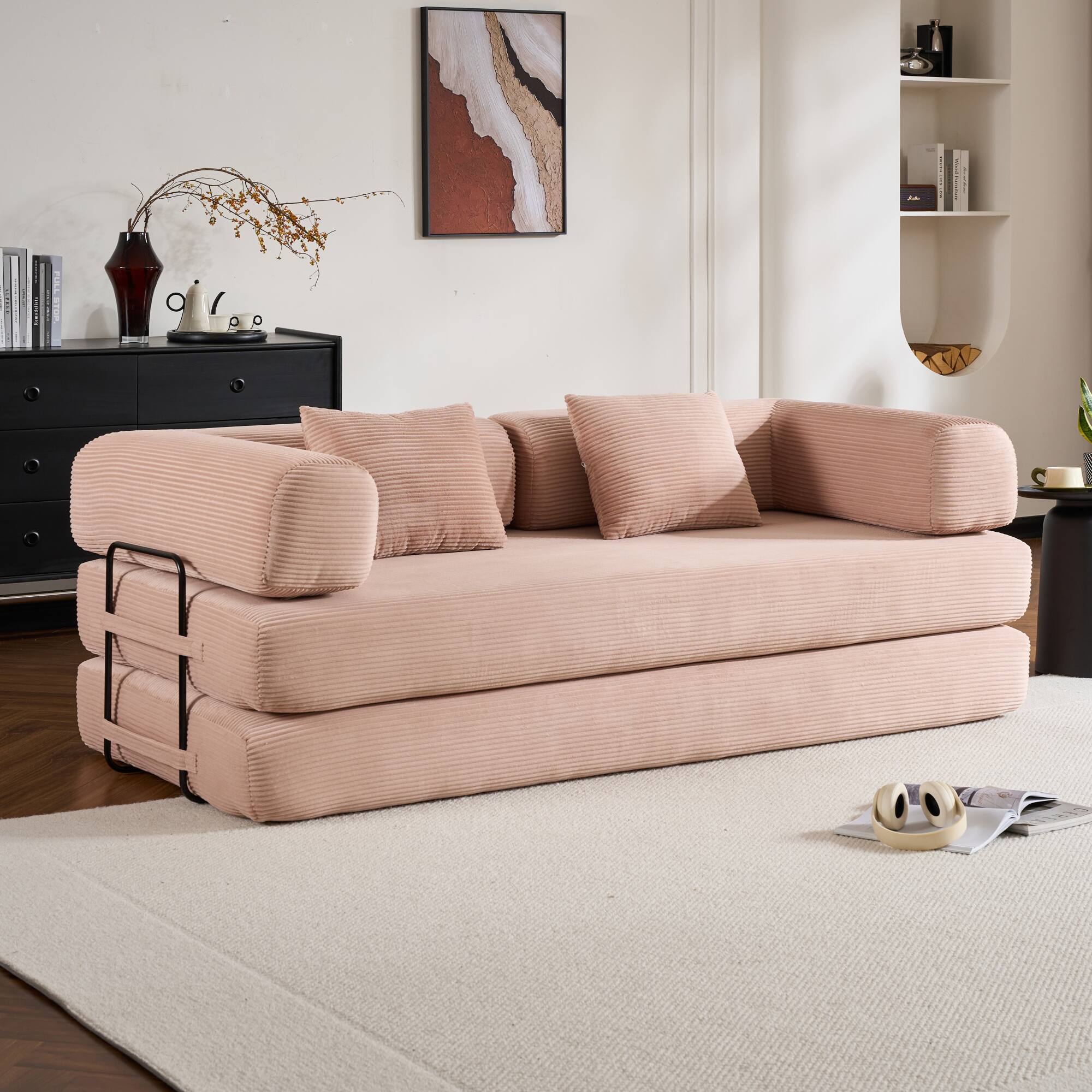 Angle. GOODSILO - Convertible Sleeper Sofa in Cylindroy Fabric | Features a Cylindrical Pillow & Space-Saving Foldable Design - Pink.