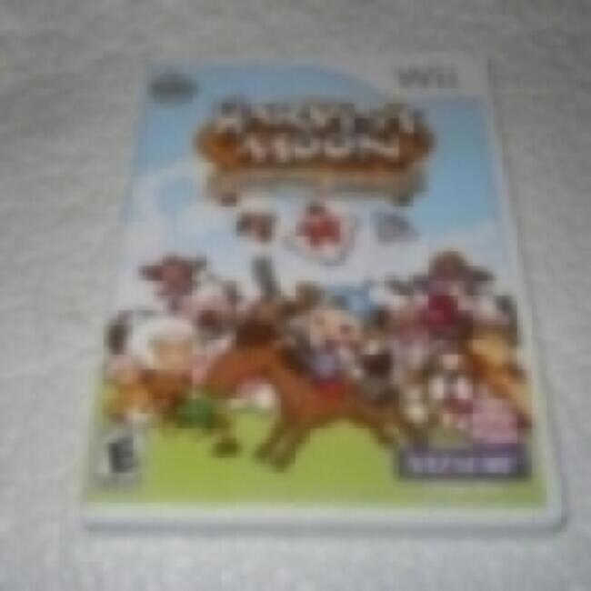 Front. Natsume - Harvest Moon: Magical Melody - Nintendo Wii.