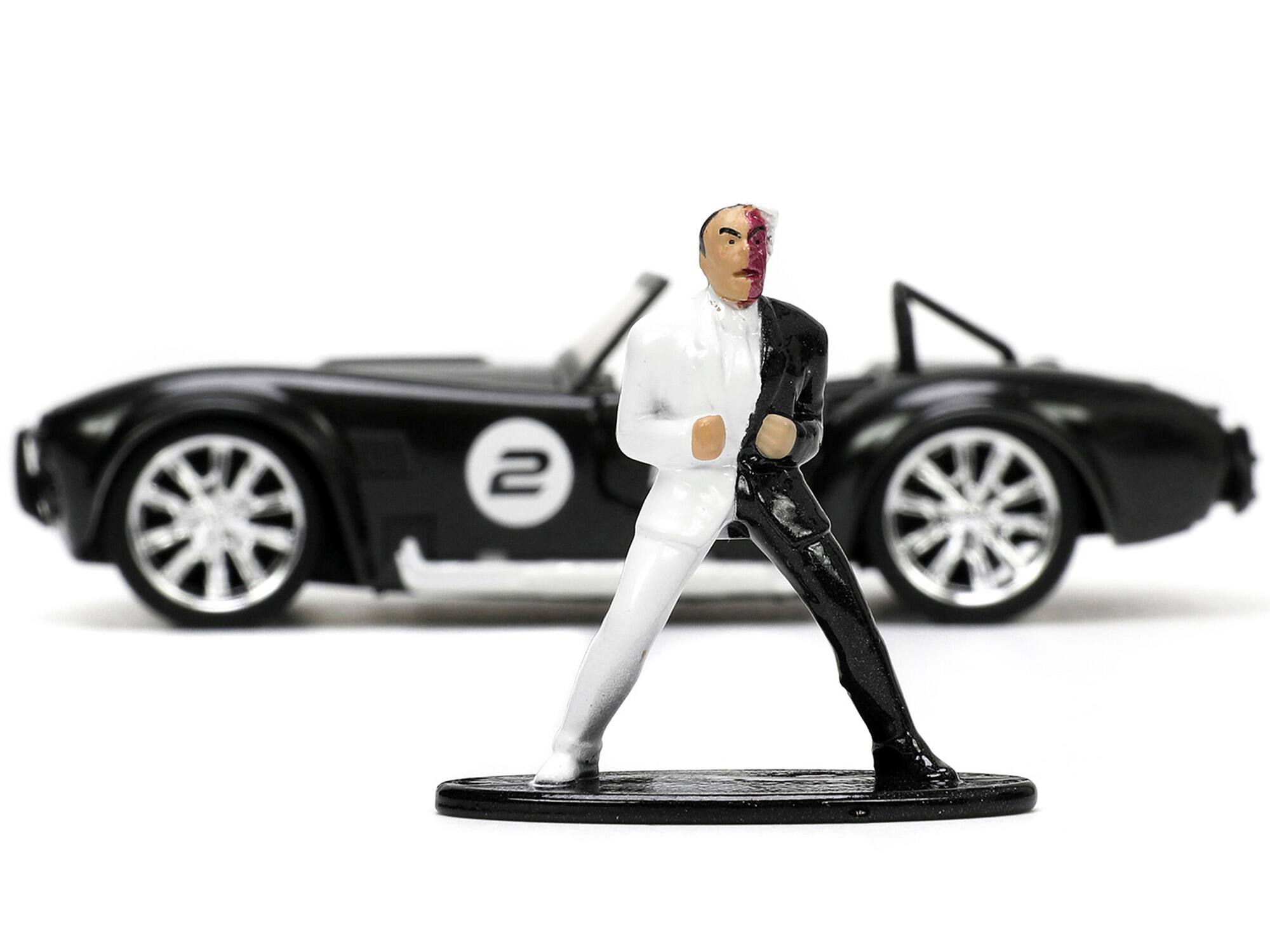 Alt View 3. Jada - 1965 Shelby Cobra 427 S/C #2 Black Metallic and White and Harvey Two-Face Figure "Batman" 1/32 Model Car by Jada.