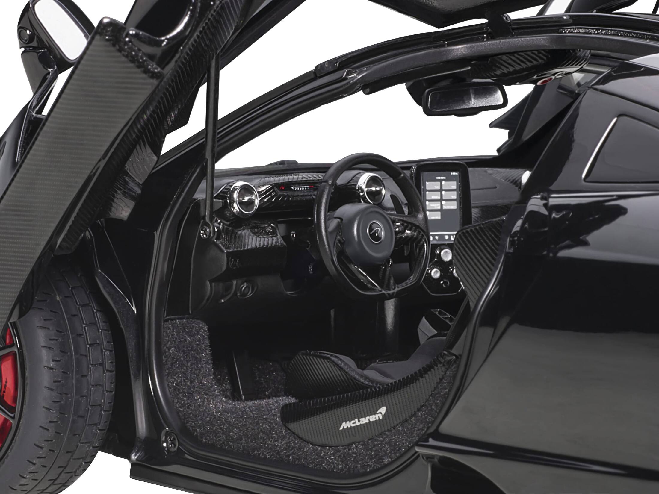 Left. Autoart - Mclaren Senna Stealth Cosmos Black with Carbon Accents 1/18 Model Car by Autoart - Cosmos Black With Carbon.