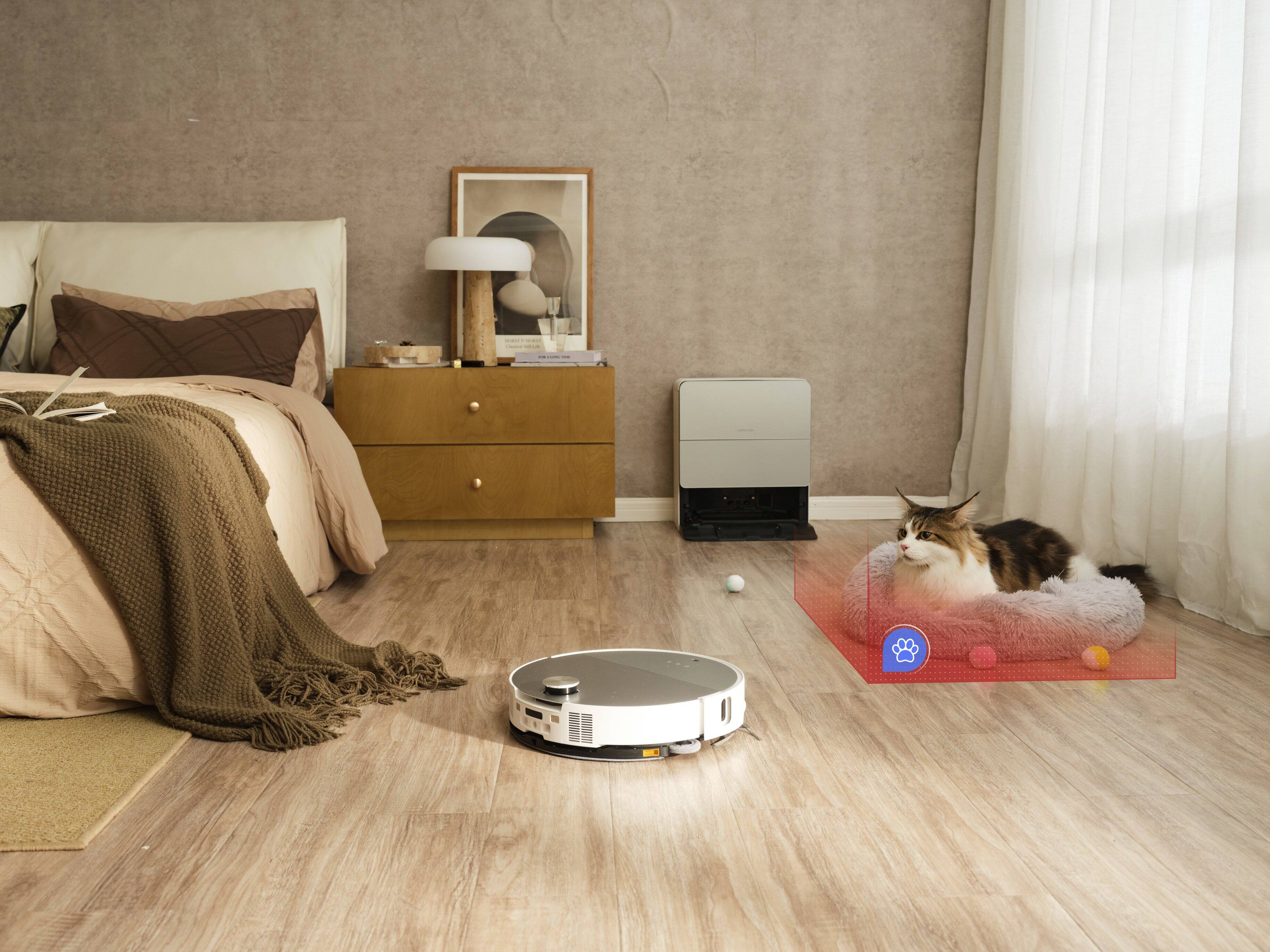 Left. Roborock - Roborock Saros 10 with Refill & Drainage System Robot Vacuum and Mop, 22,000Pa Suction, AI Obstacle Avoidance.