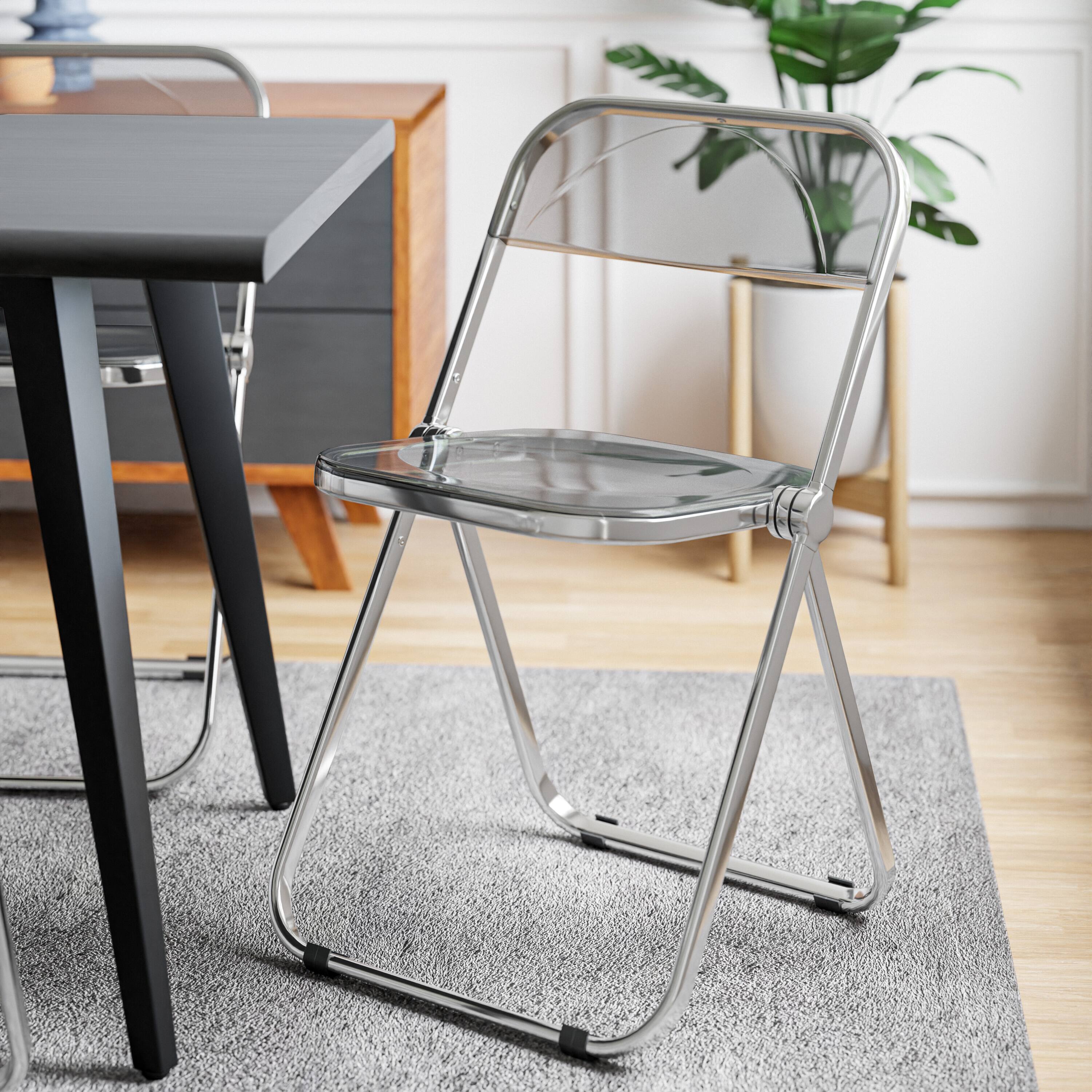 Angle. LeisureMod - Lawrence Modern Clear Acrylic Folding Chair with Chrome Steel Frame, Fully Assembled Portable Dining Seat - Transparent Black.