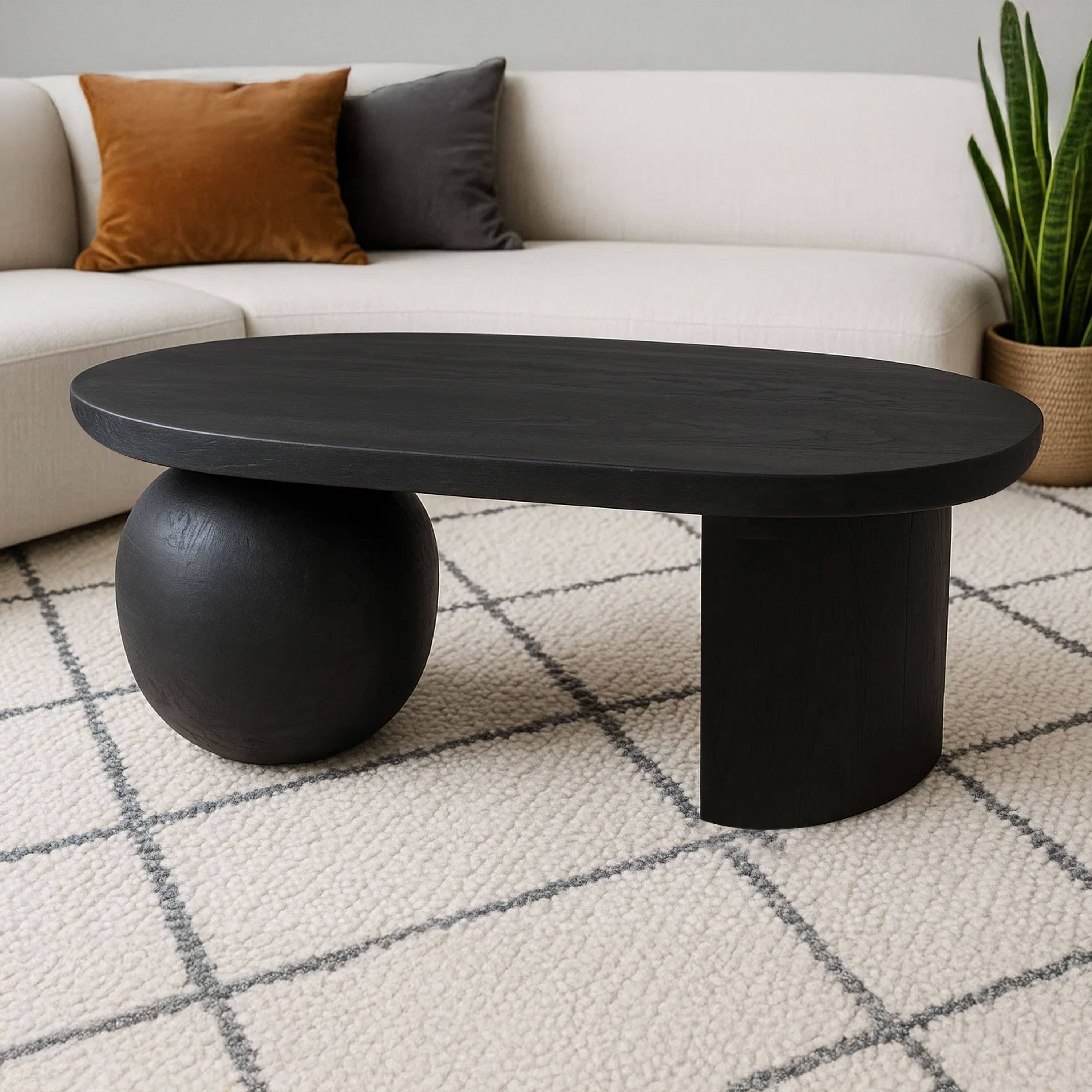Alt View 9. Manhattan Lane - Uri 38 Inch Oval Coffee Table, Mango Wood Full and Half Spherical Leg - Sanblasted Black.