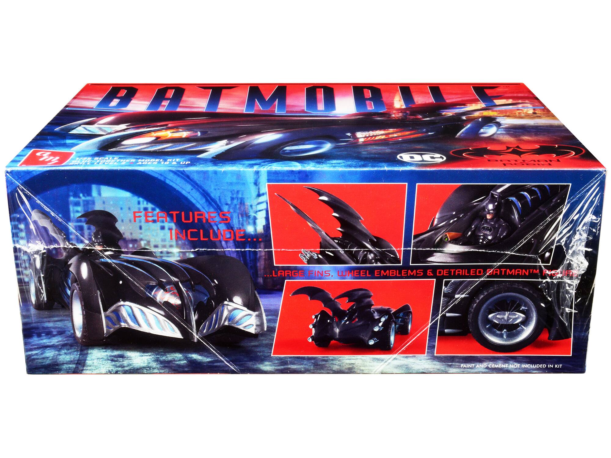 BATMOBILE C Te S2E5 SRALE | PETER RREEI NI N UP 2 RVEL AGER i - UC BUTHAN Nebidt FEATURES INCLUDE... ...LARGE FINS, WHEEL EMBLEMS 6 DETAILED BATMAN™ FIGURE PAINT AND CEMENT NOT INCLUDED IN KIT