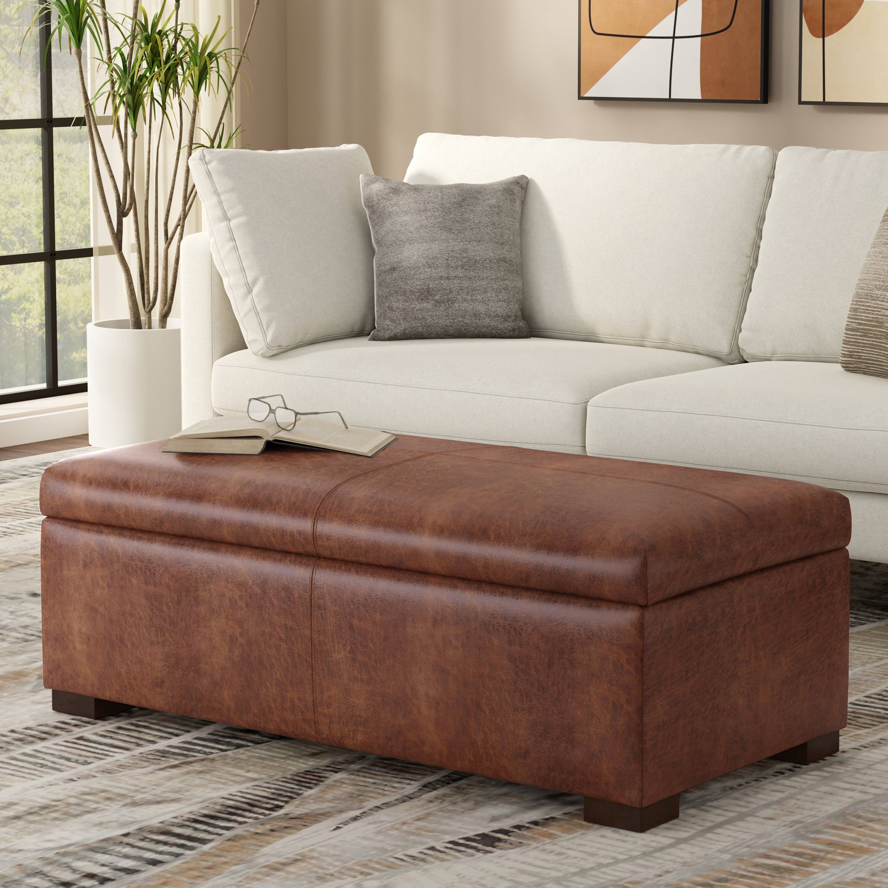 Angle. Simpli Home - Gabbie 48 inch Wide Rectangular Storage Ottoman in Distressed Saddle Brown Vegan Leather - Distressed Saddle Brown.