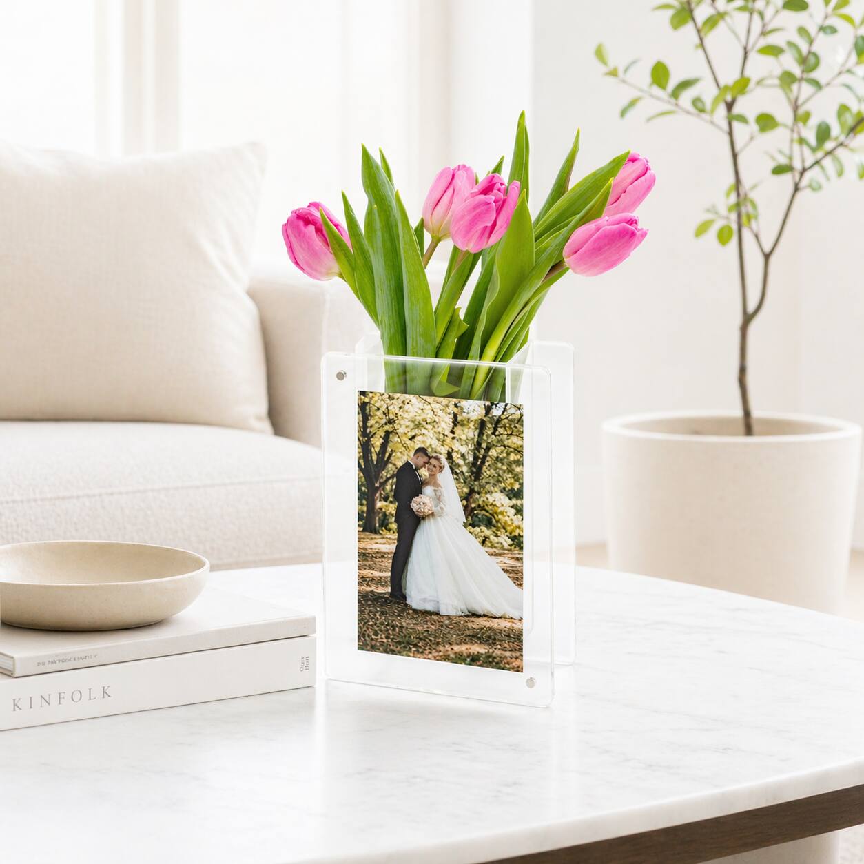 Angle. Zeldora Collection - Zeldora Acrylic Picture Frame Vase, Magnetic Leak-Proof Frame for 4x6 & 5x7 Photos, Vertical, 7.5 x 5.5 x 2 in - Clear.