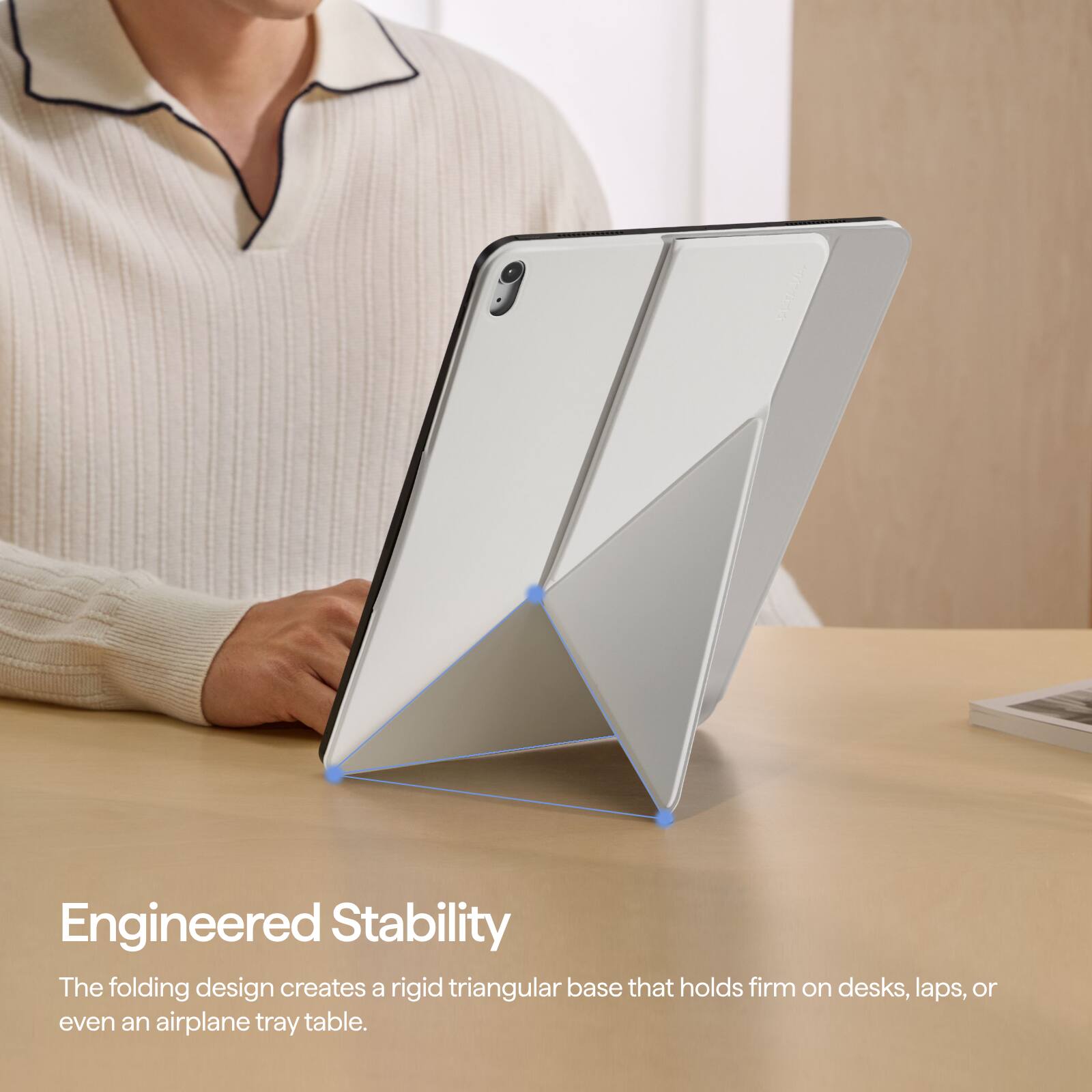 Engineered Stability  
The folding design creates a rigid triangular base that holds firm on desks, laps, or even an airplane tray table.