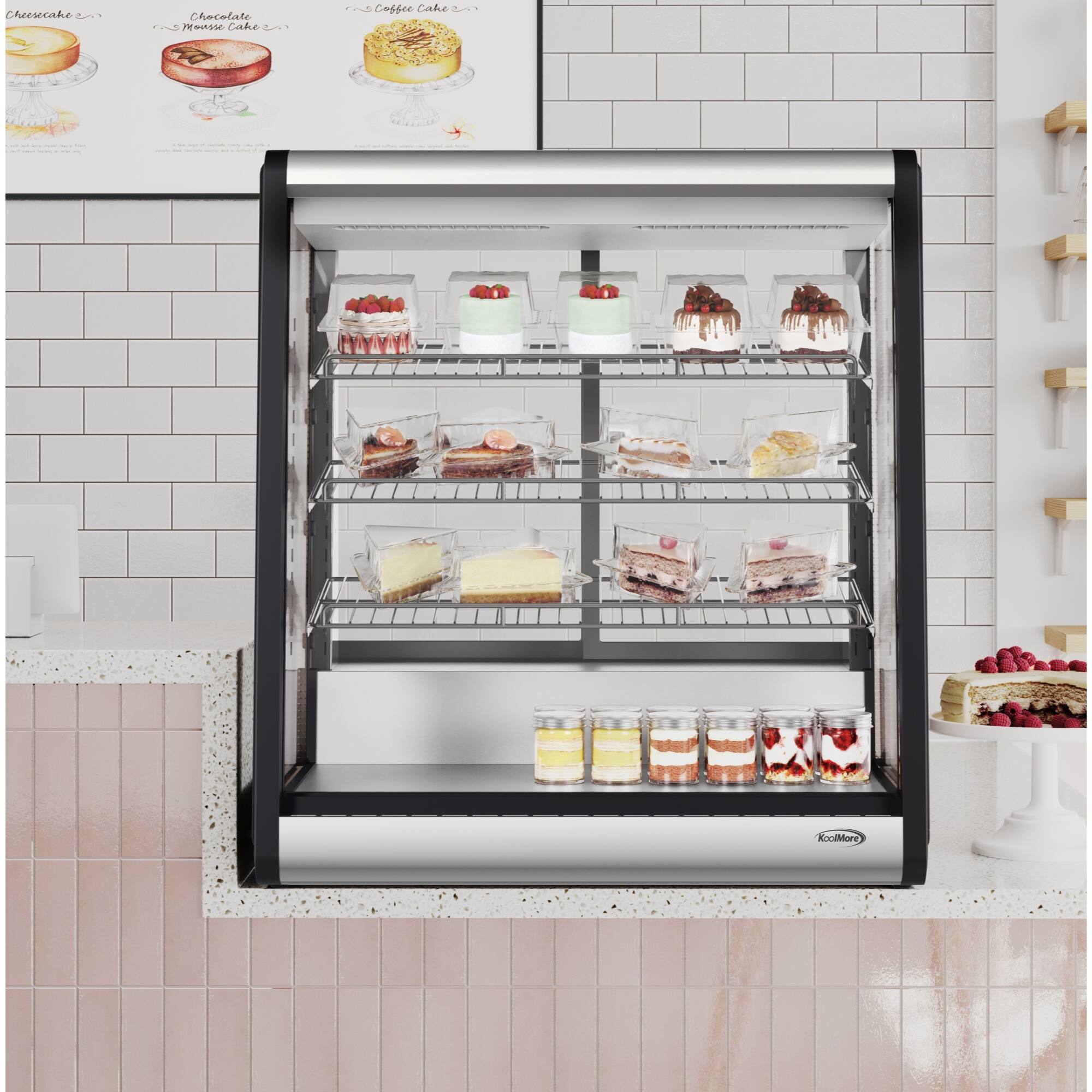 Cheesecake, Cheeselate, Fruit Tarts, Caffe Cake, and Kouign Amman are displayed in a case at a bakery.