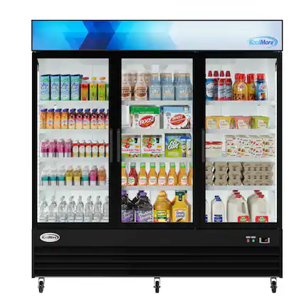 The image shows a refrigerator filled with various drinks and food items. The refrigerator is stocked with a variety of bottles, including juice, milk, and other beverages. There are also several bottles of water, with some placed in the middle and others towards the top of the refrigerator. Additionally, there are a few bottles of soda, with one located near the top left corner and another near the top right corner. The refrigerator is well-stocked and offers a wide selection of drinks for customers to choose from.