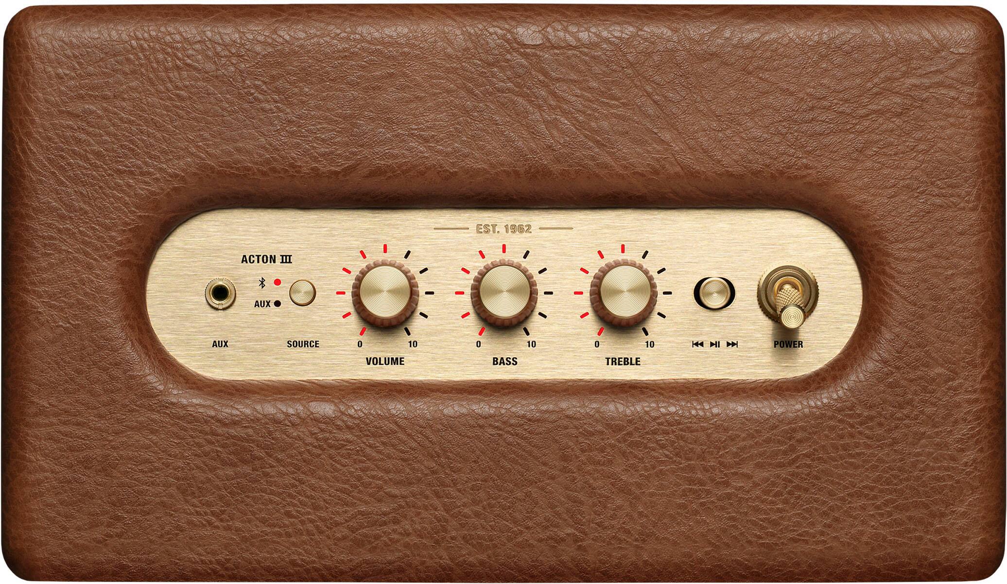 The text on the image is grouped and corrected as follows:

"EST. 1962 ACTON III AUX AUX SOURCE 0 10 0 10 0 10 H4 I M POWER VOLUME BASS TREBLE"