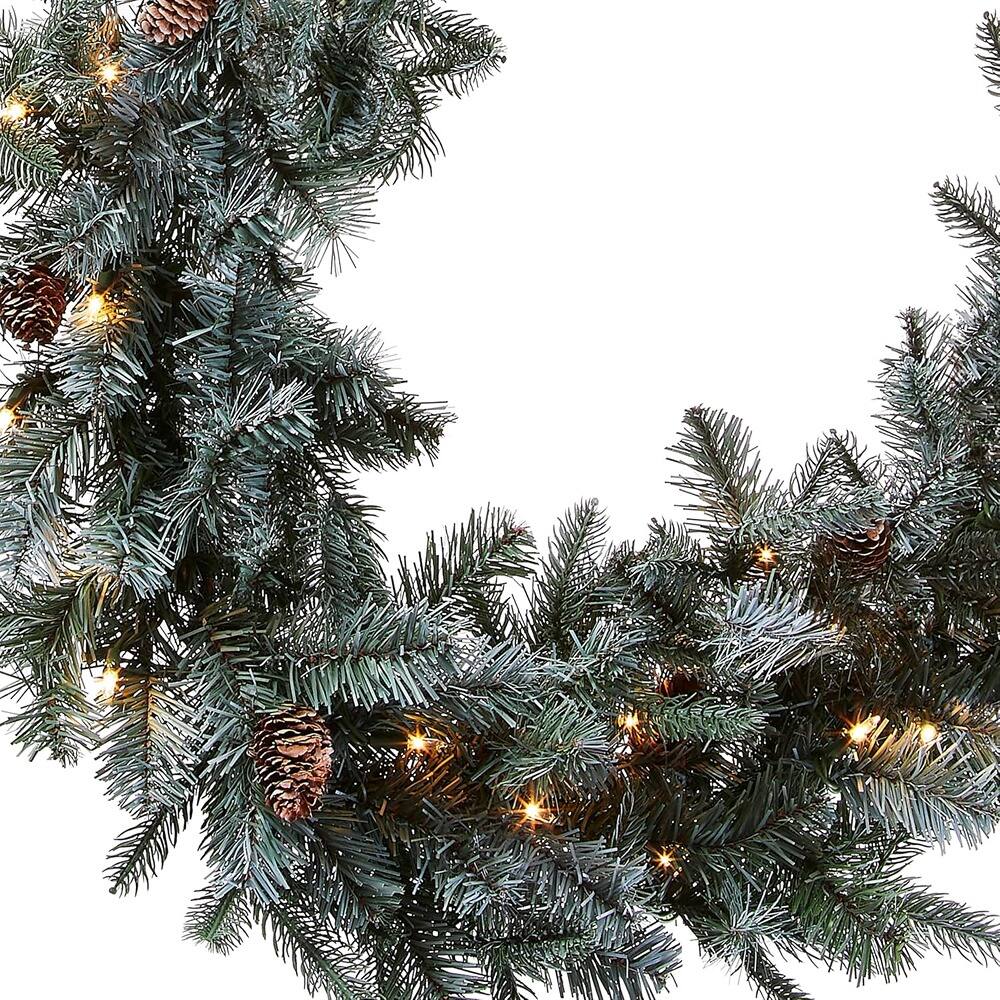Angle. PARKER SLATER - 9ft Pre-Lit Arctic Spruce Christmas Garland with White Lights & Pine Cones - Green.