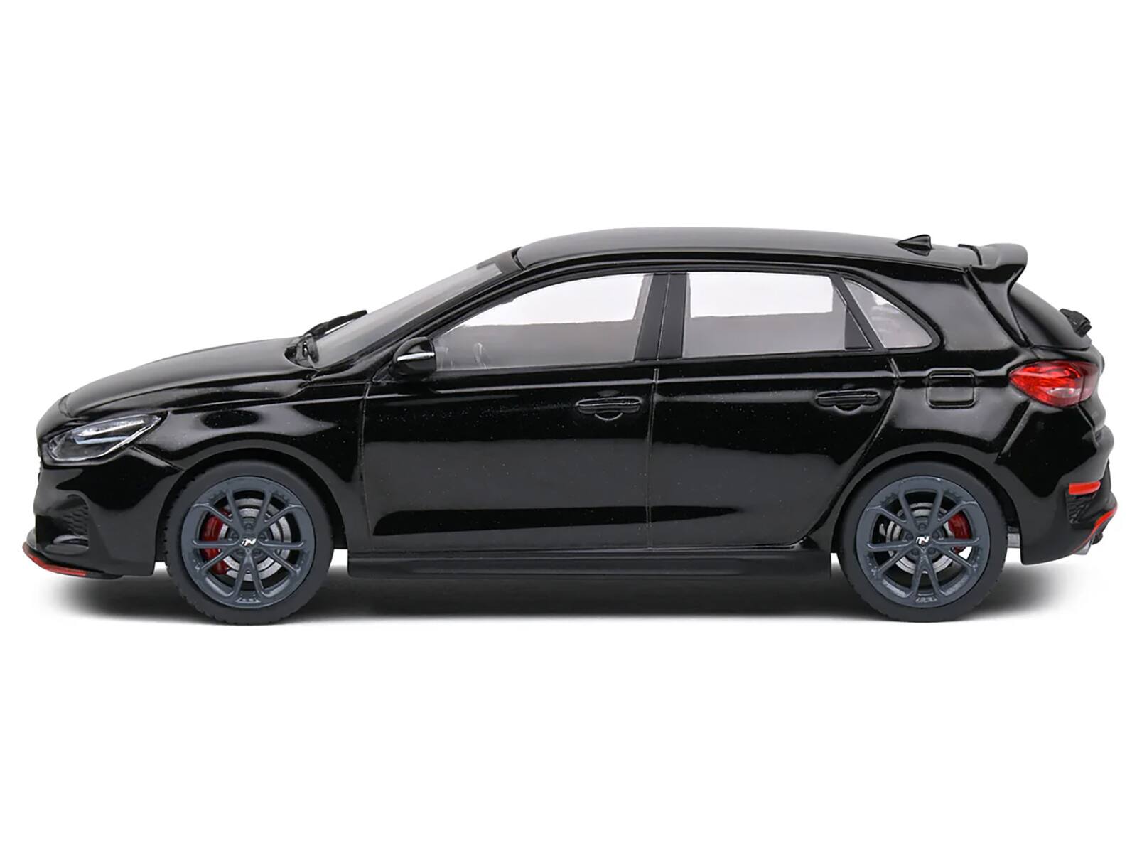 Angle. Solido - Hyundai i30 N Phantom Black 1/43 Diecast Model Car by Solido - Black.