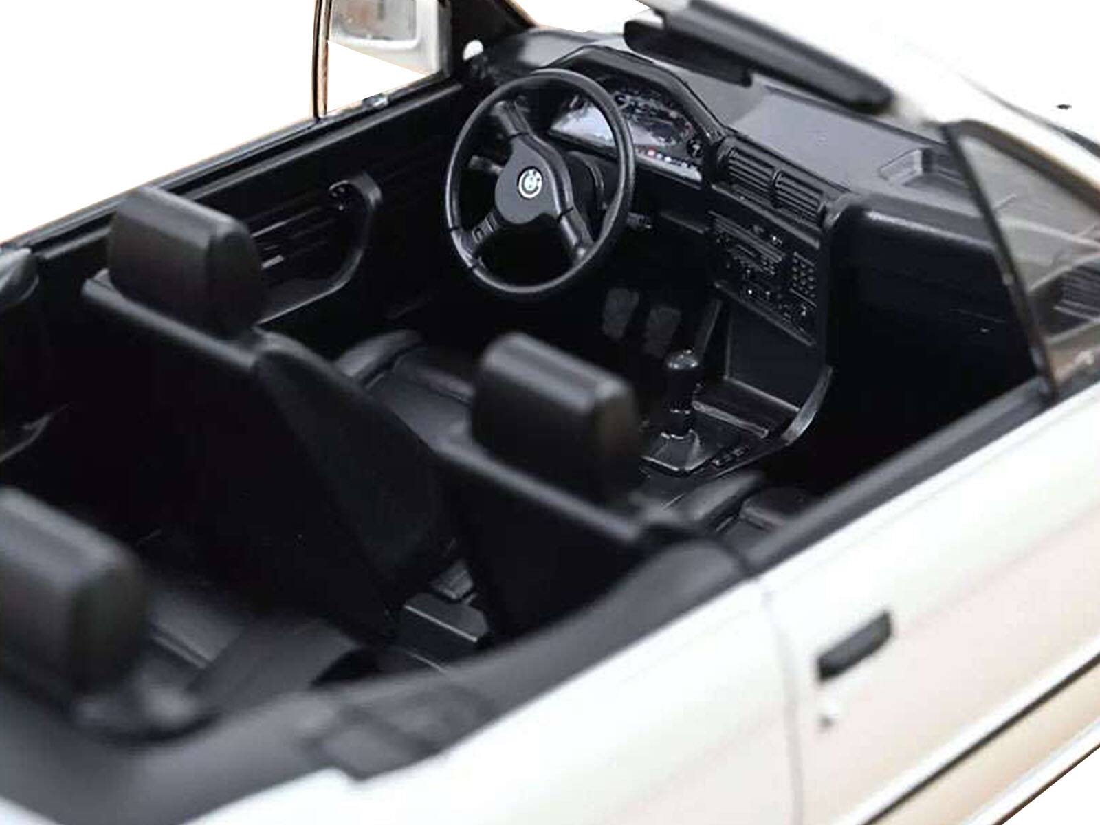 Alt View 1. Norev - 1991 BMW 325i Cabriolet Alpine White 1/18 Diecast Model Car by Norev.