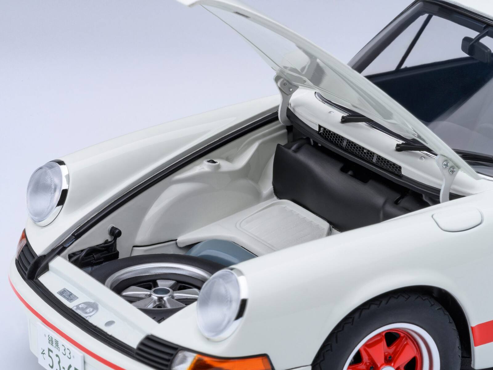 Alt View 3. Autoart - Porsche 911 Carrera 2.7 RS "The Circuit Wolf" White with Red Stripes & Wheels w/Hood Graphics 1/18 Model Car by Autoart.