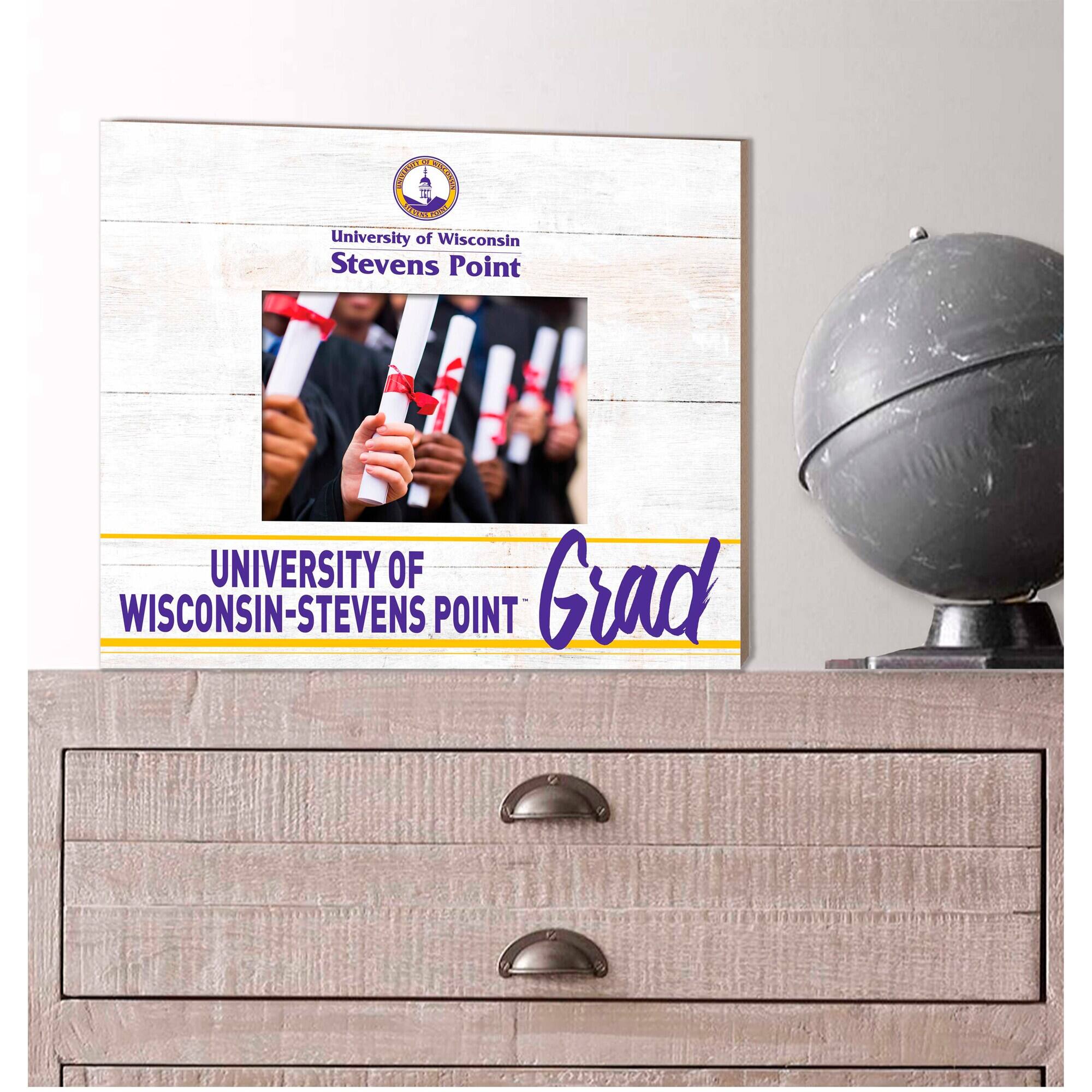 - DOOMEE T H DRLES O University of Wisconsin Stevens Point UNIVERSITY OF WISCONSIN-STEVENS POINT Grad