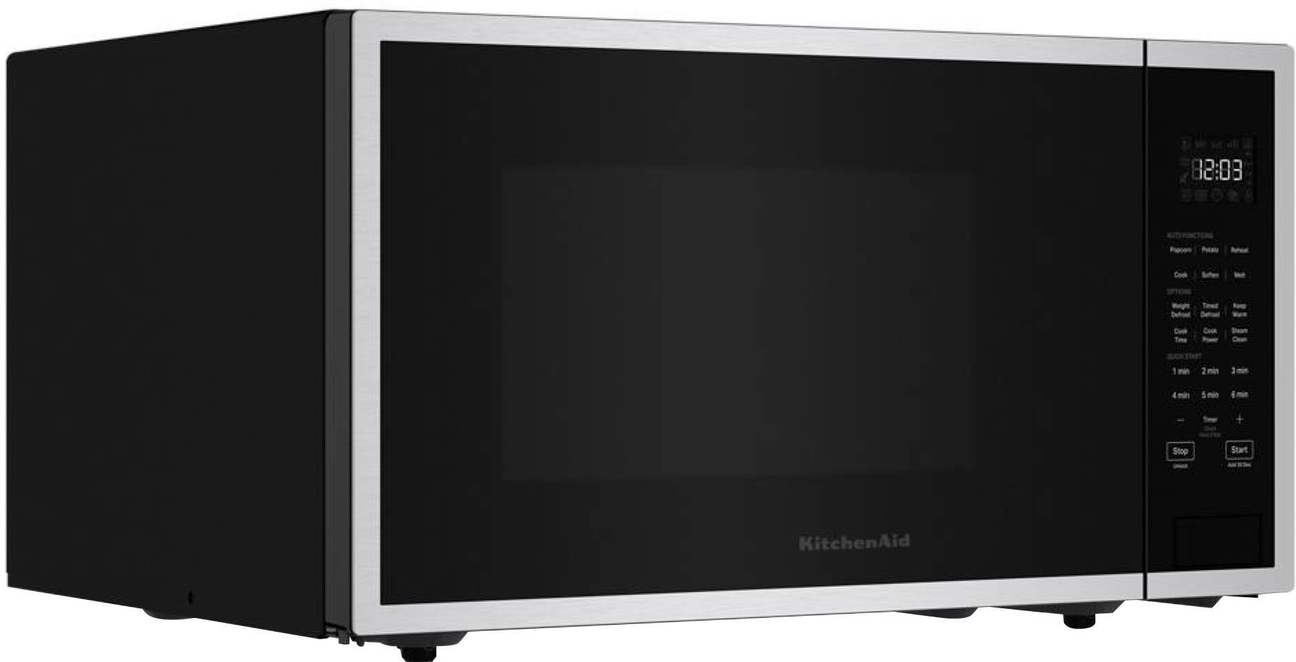 The text on the image reads: "82:08 Pocace fo Anca Cook Soten Taed C GHA 1 - 2 2min 1 E min 1 - f + Stop Start KitchenAid". This text is likely a description or instructions for using the microwave. The text appears to be a mix of different languages, and it is not clear what the intended meaning is. However, it seems to be related to the microwave and its functions.