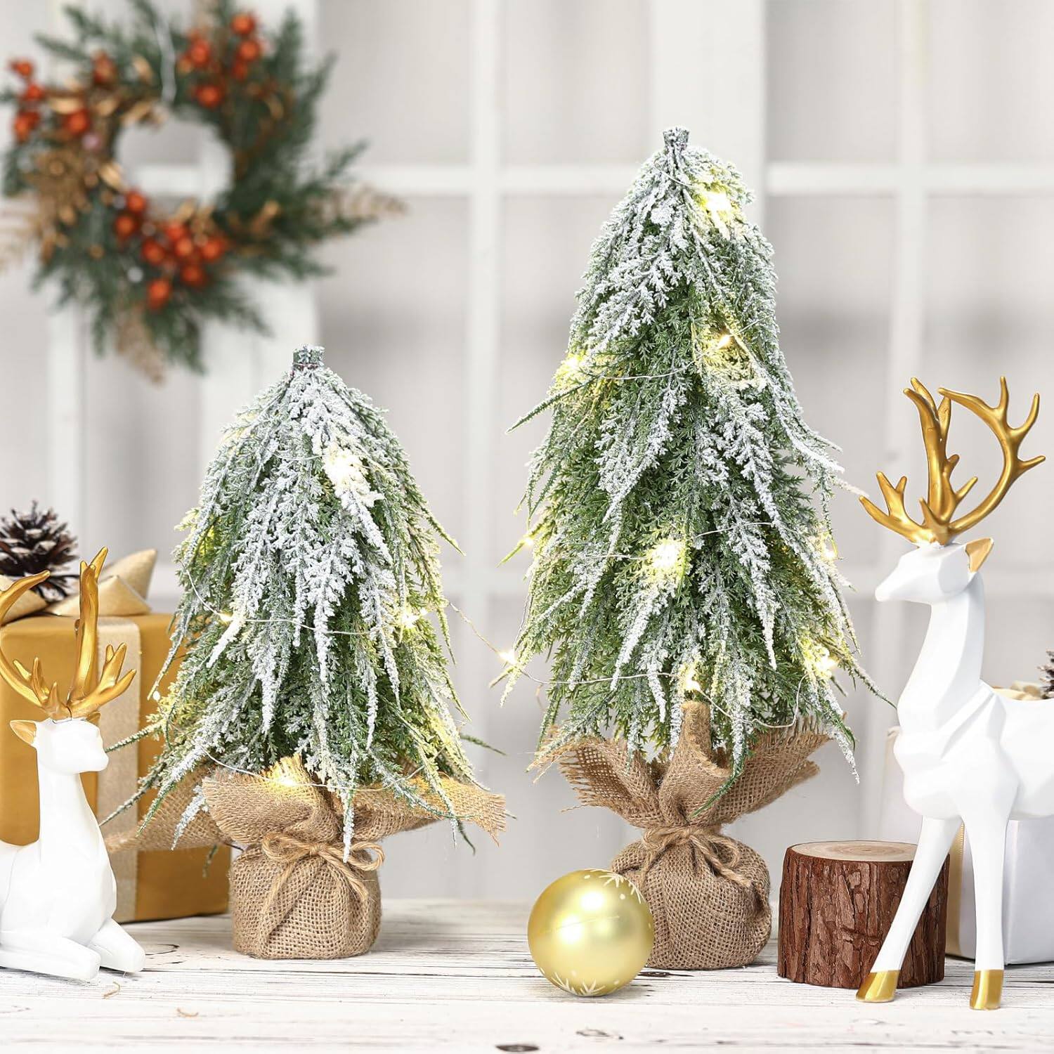 Alt View 1. RTMB - 11.8" & 15.7" Pre-Lit Snow-Flocked Pine Trees with Warm LEDs & Wood Base - Main Green and White.