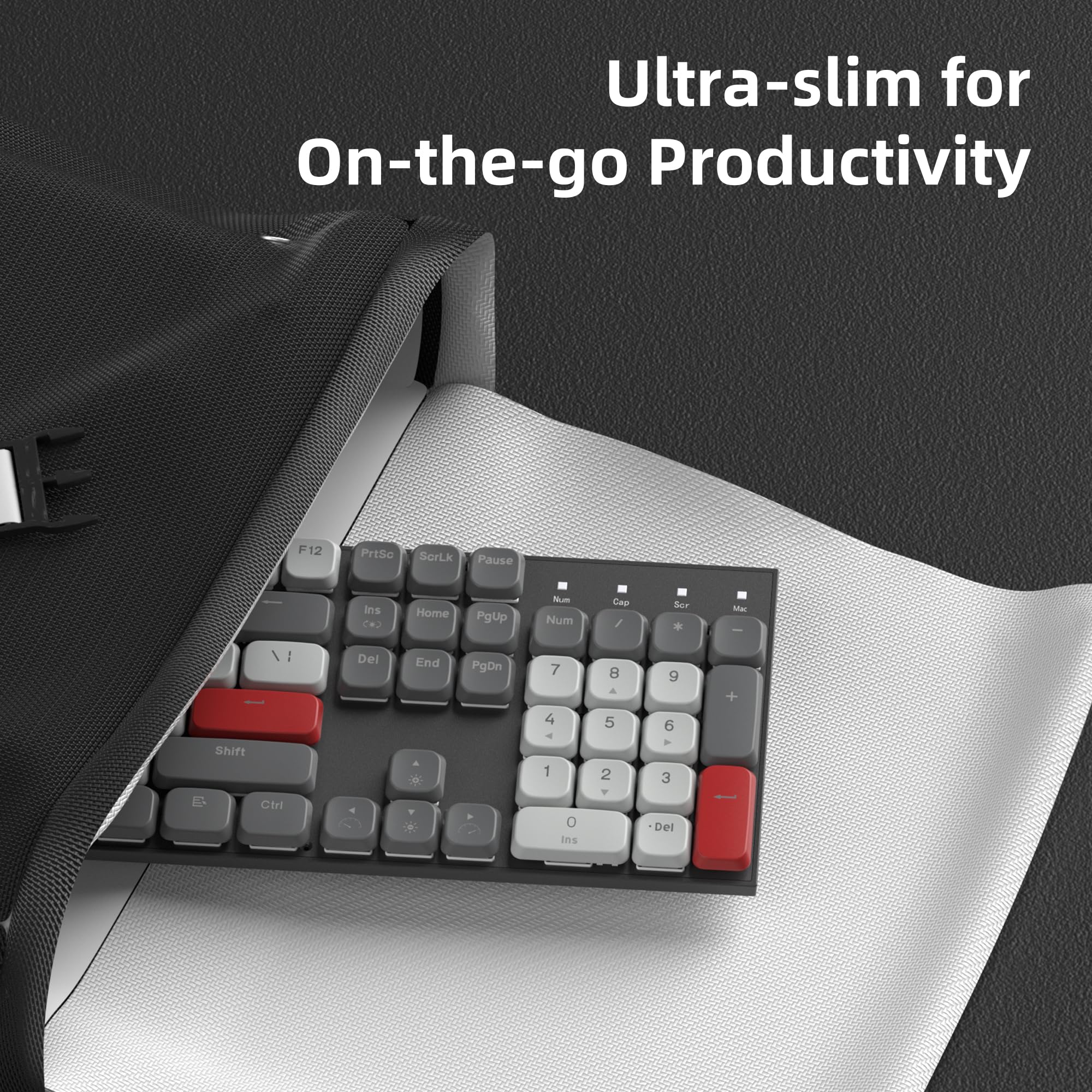 Ultra-slim for On-the-go Productivity

F12 PrtScn ScrLk Pause Ins Home PgUp Num Cap Ser * : Del End PgDn 7 8 9 + Shift Ctrl 4 5 6 - 1 2 3 Del