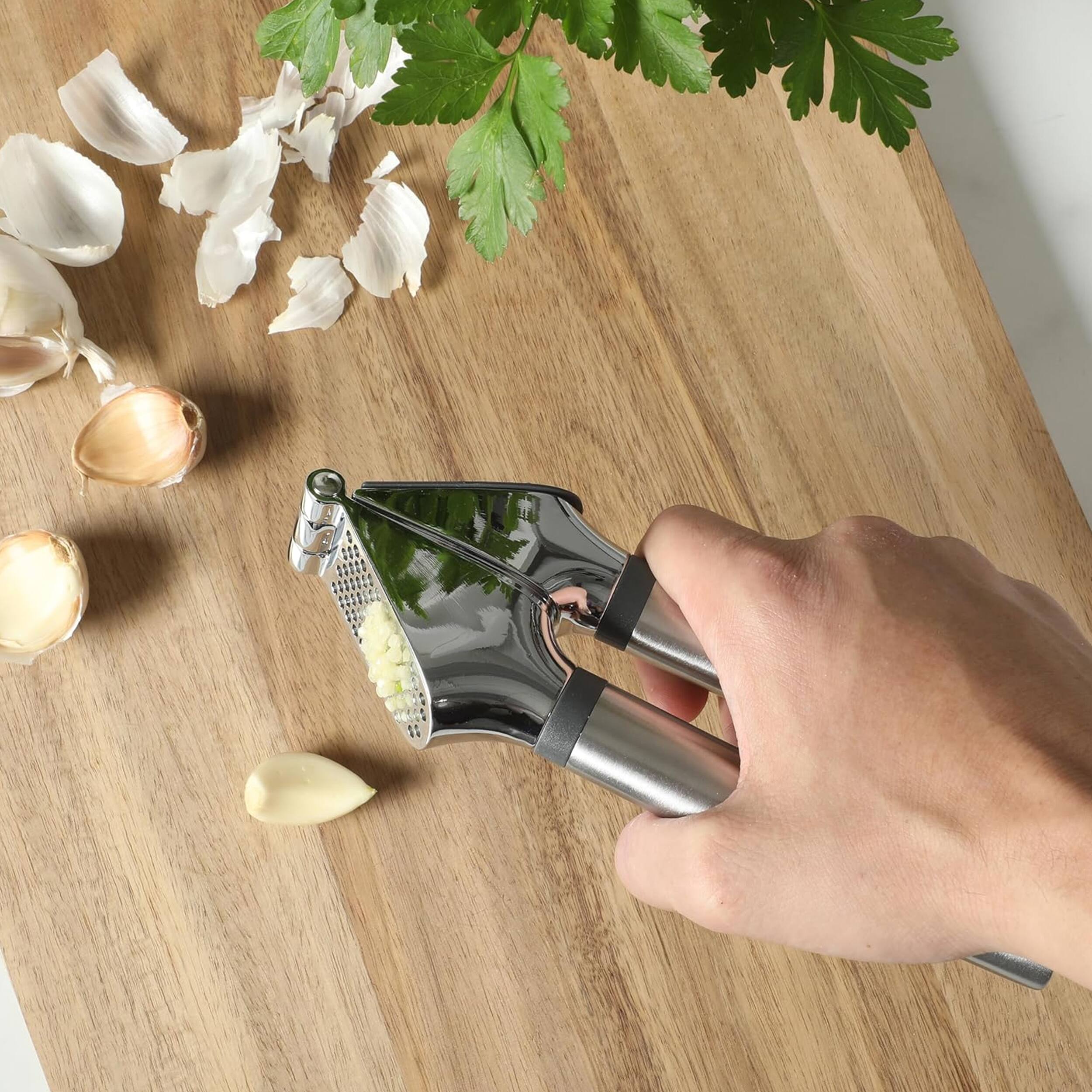Alt View 4. Oster - Oster Chadswyck 7.7 Inch Stainless Steel Garlic Press in Silver.