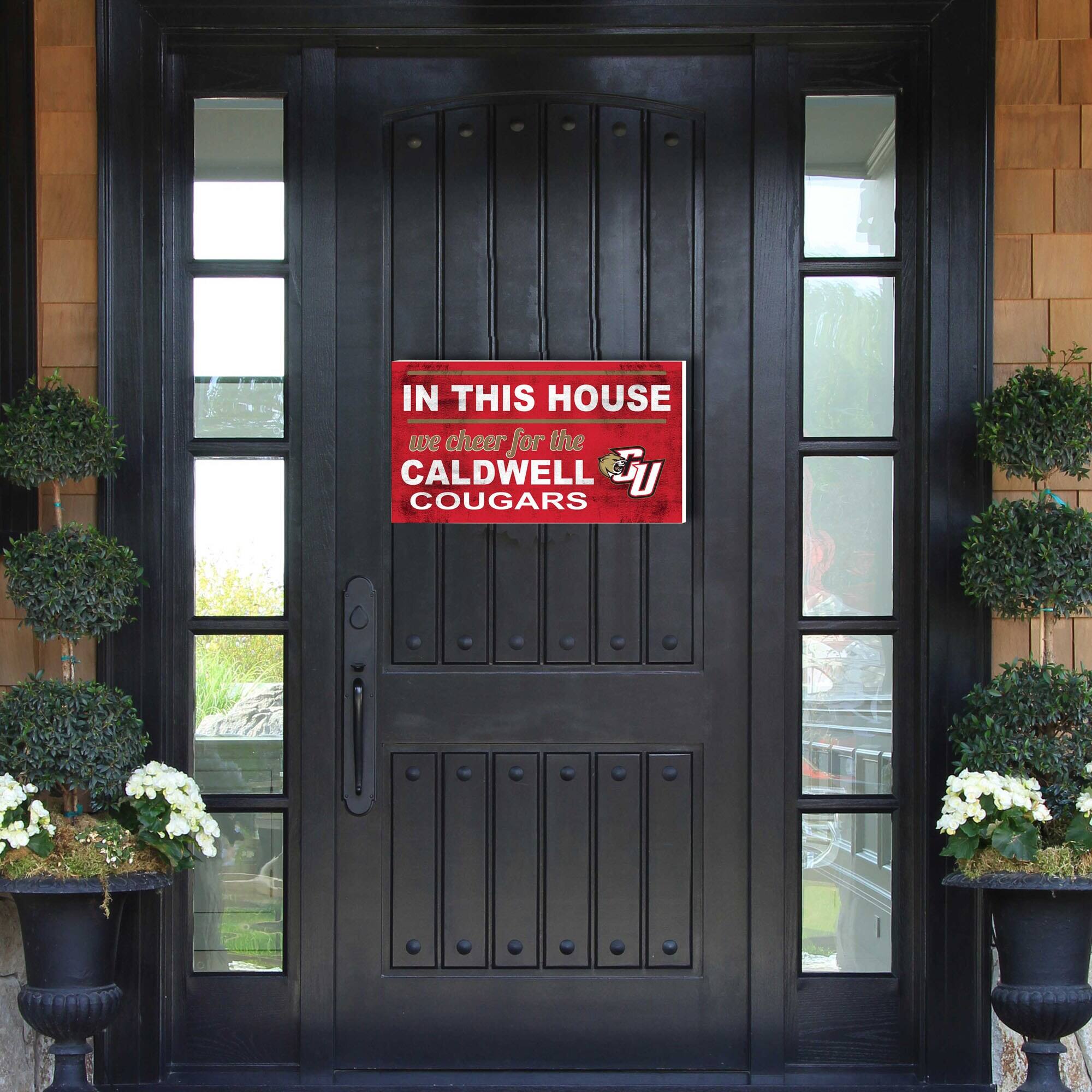 IN THIS HOUSE  
we cheer for the CALDWELL COUGARS