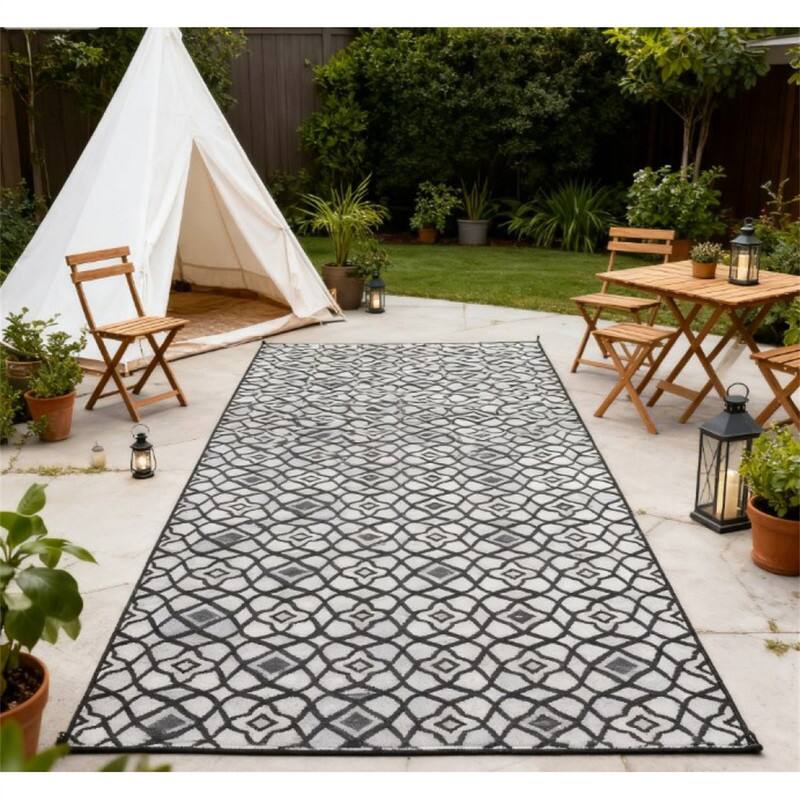 Alt View 4. HTUTWOO - 9' x 18 Patio Reversible Outdoor Rug - RV Camping Carpet with Carry Bag, Mud-Resistant Fade-Proof, Foldable Portable Mat - Black White.