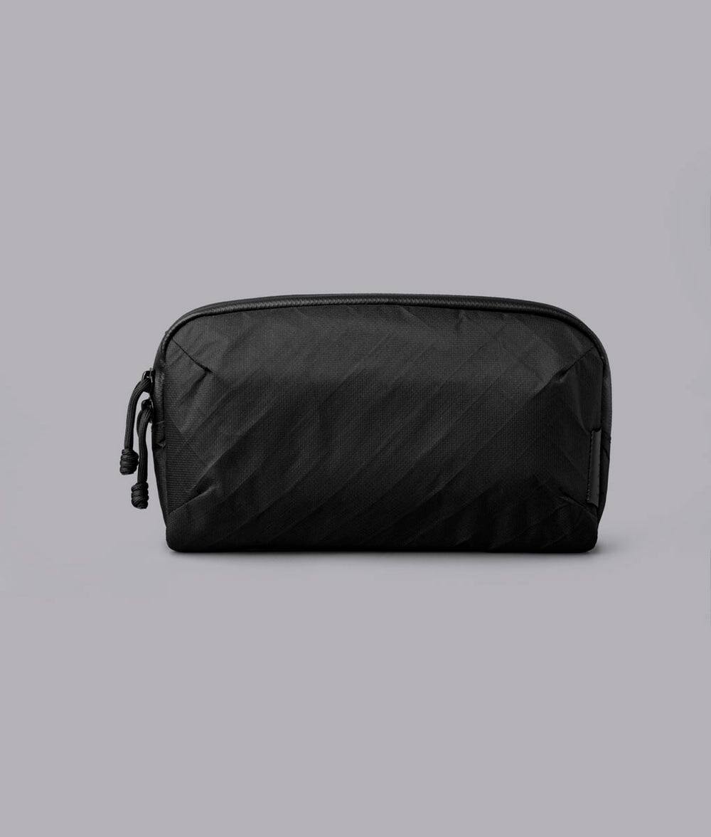 Left. ALPAKA - Flight Pouch Pro Travel Clutch Phone Bag, RFID Passport Holder Crossbody Pouch, Wristlet, YKK AquaGuard - Black Ultradyne 100D.