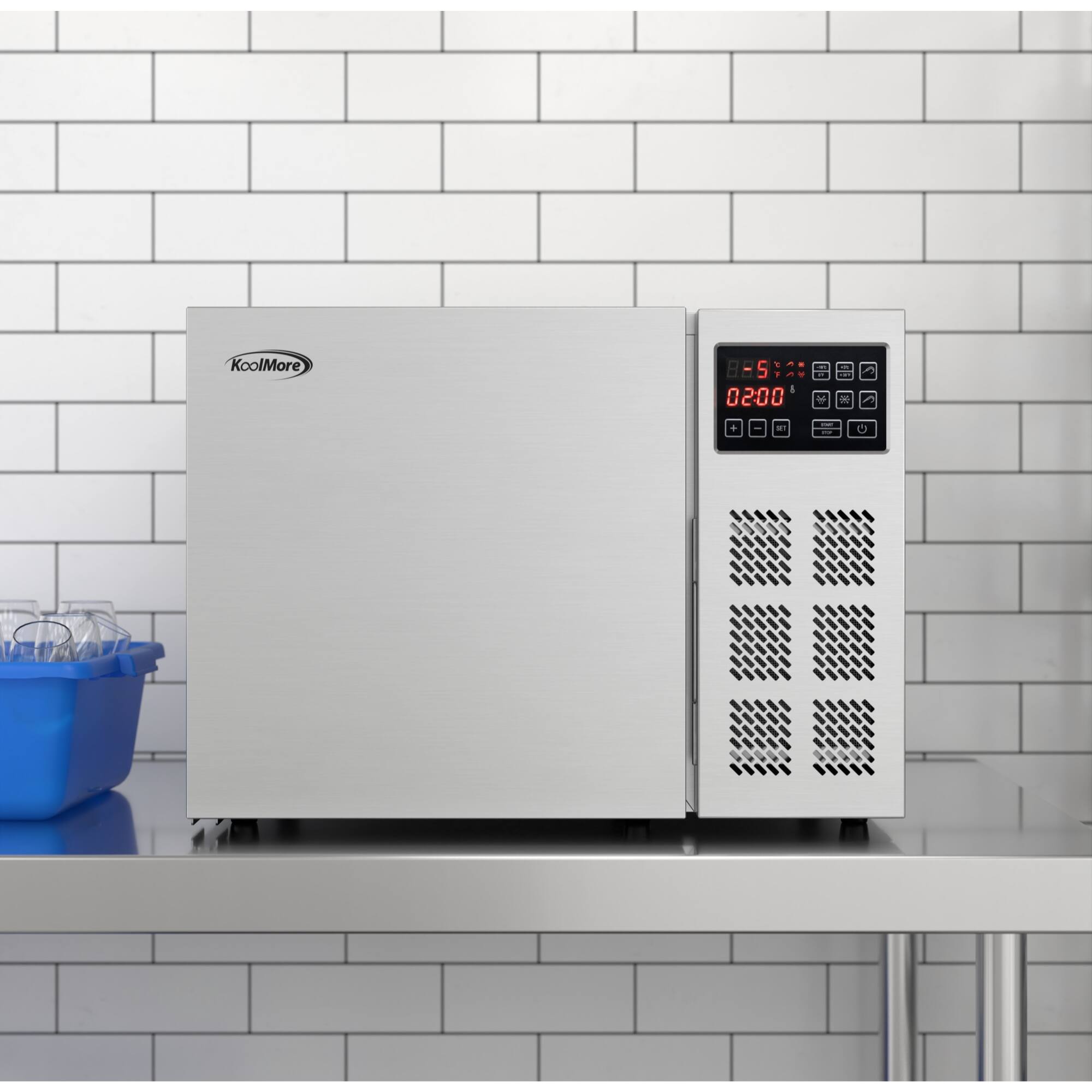 The text on the image reads "KoolMore 88S:20 5 0200 - + a." This text is likely a part of the digital display on the machine, which is a refrigerator or freezer. The numbers "20" and "5" could represent the temperature settings, while the "0200" might be the time or date. The "a" at the end could be a part of the display or a typo.