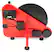 The image features a red machine with a black and red wheel, possibly a toy or a piece of equipment. The machine has a red handle, and there is a black box with a red wheel attached to it. The machine is placed on a white background, making it stand out prominently.