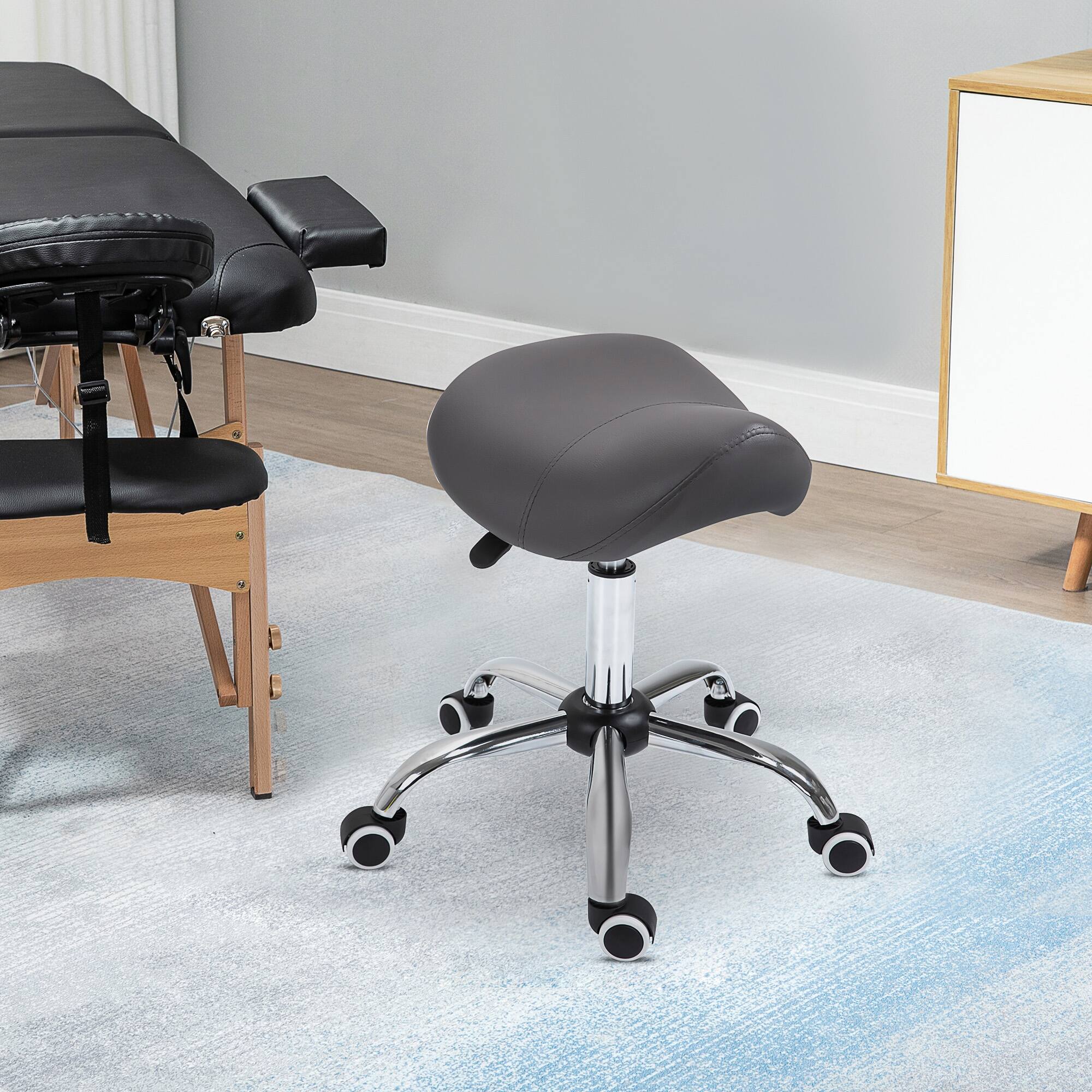 Alt View 1. Homcom - Ergonomic Rolling Saddle Stool PU Leather Hydraulic Spa Stool Height Adjustable Swivel Drafting Medical Salon Chair - Grey.