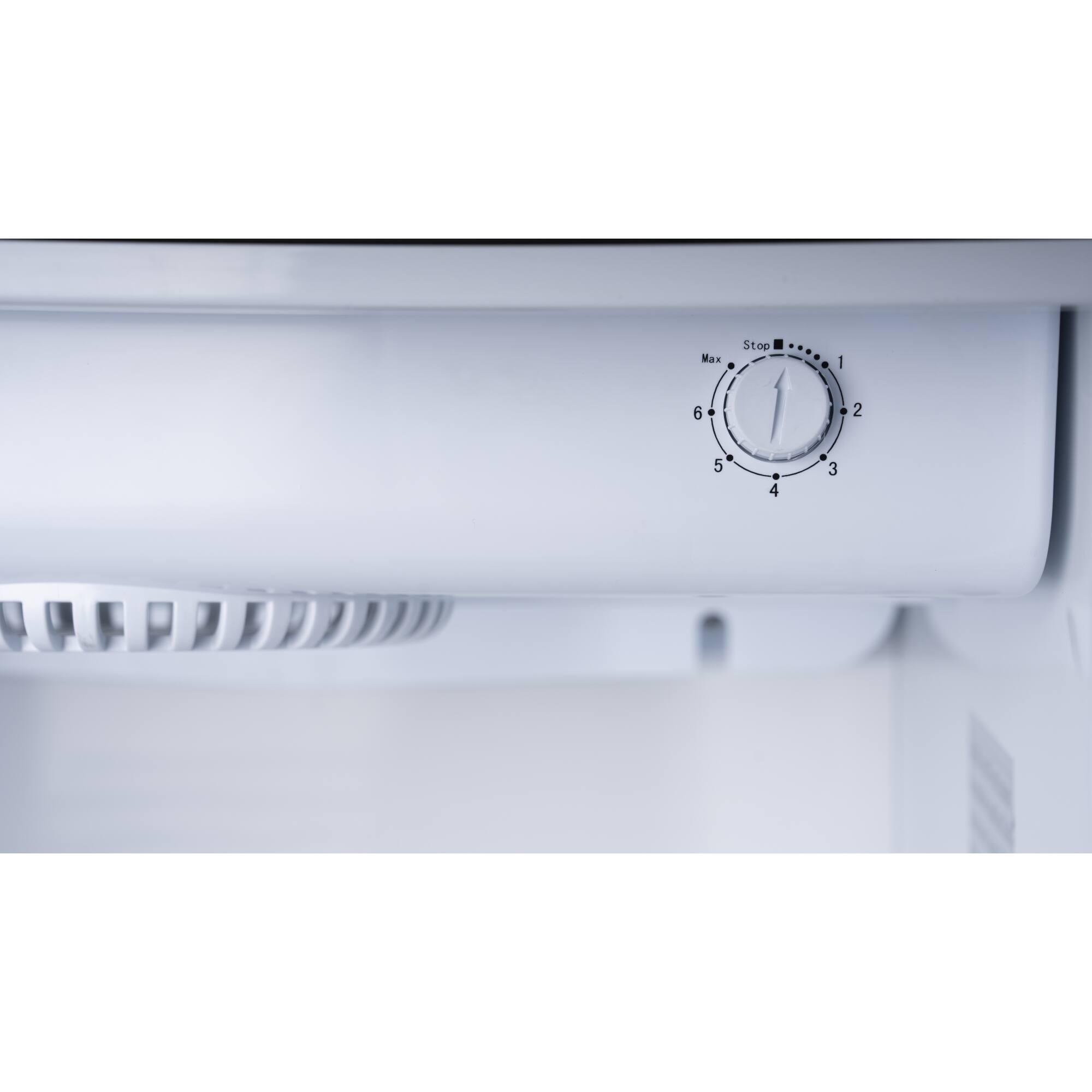 The text on the image reads "Max Stop 1 6 2 5 + 4 3." This text is likely related to the settings or functions of the appliance, such as a microwave or oven. The numbers represent the maximum settings for each function, with the numbers increasing as the settings become more intense.