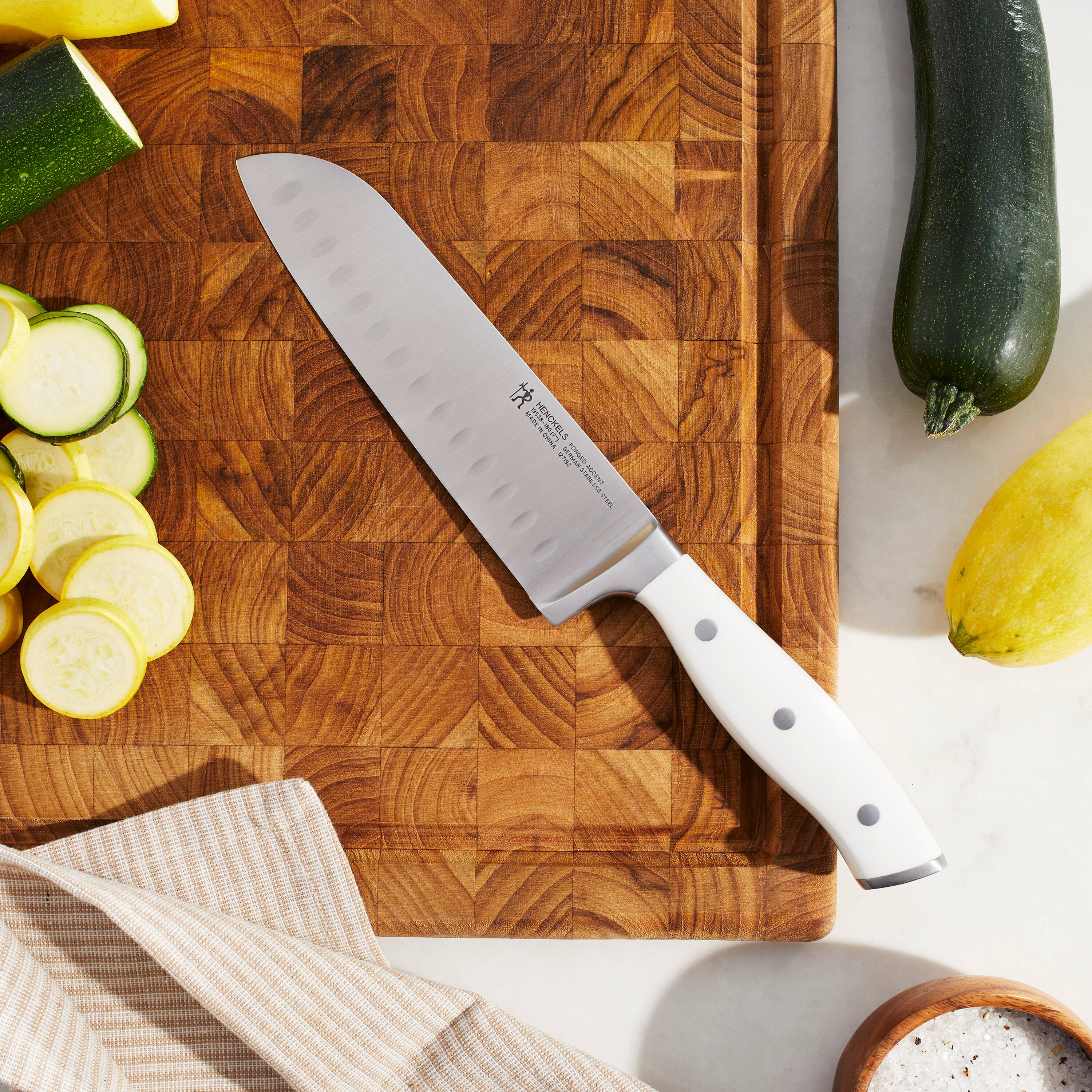 Alt View 1. Henckels - Henckels Forged Accent 7-inch Hollow Edge Santoku Knife - White Handle - Stainless Steel.