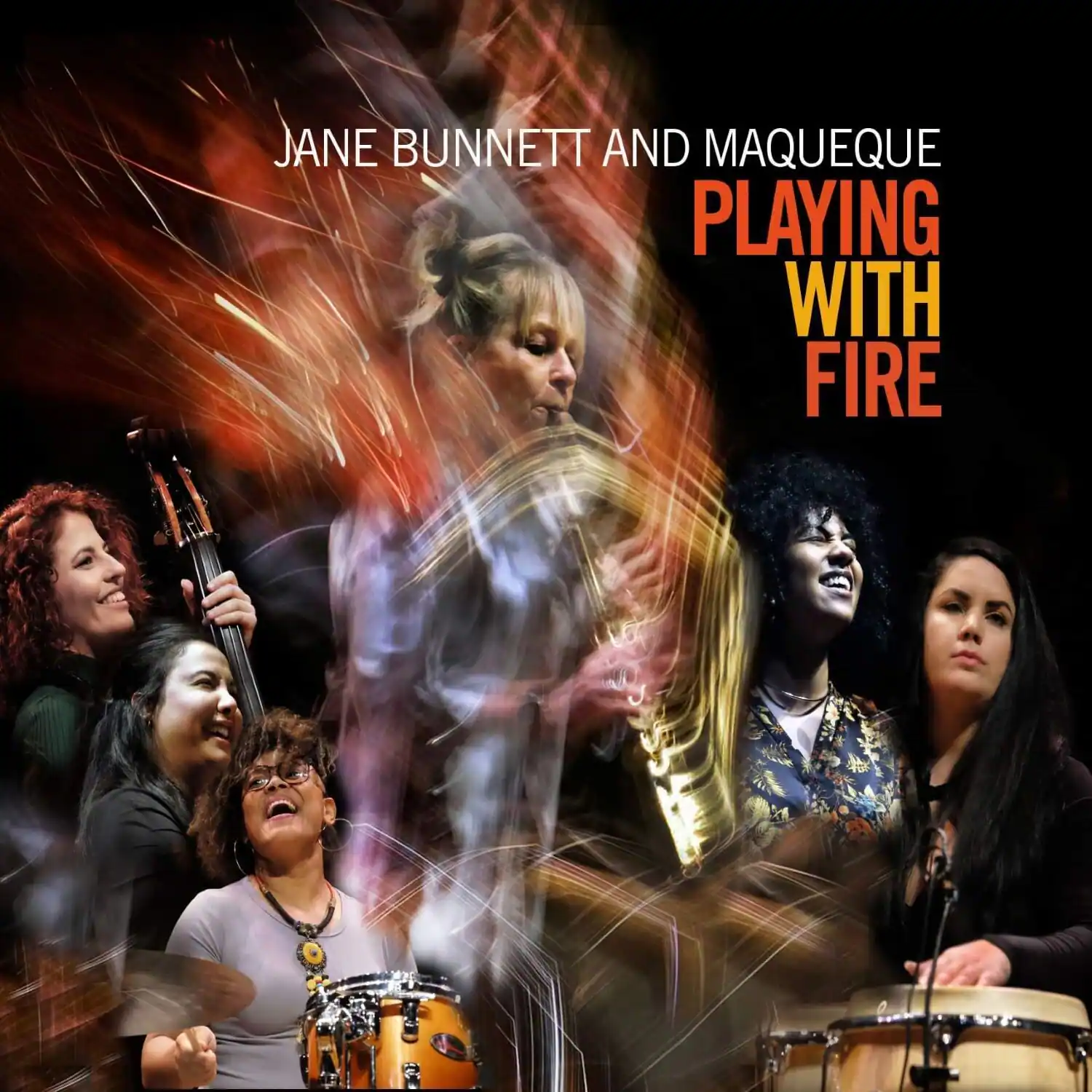 JANE BUNNETT AND MAQUEQUE  
PLAYING WITH FIRE