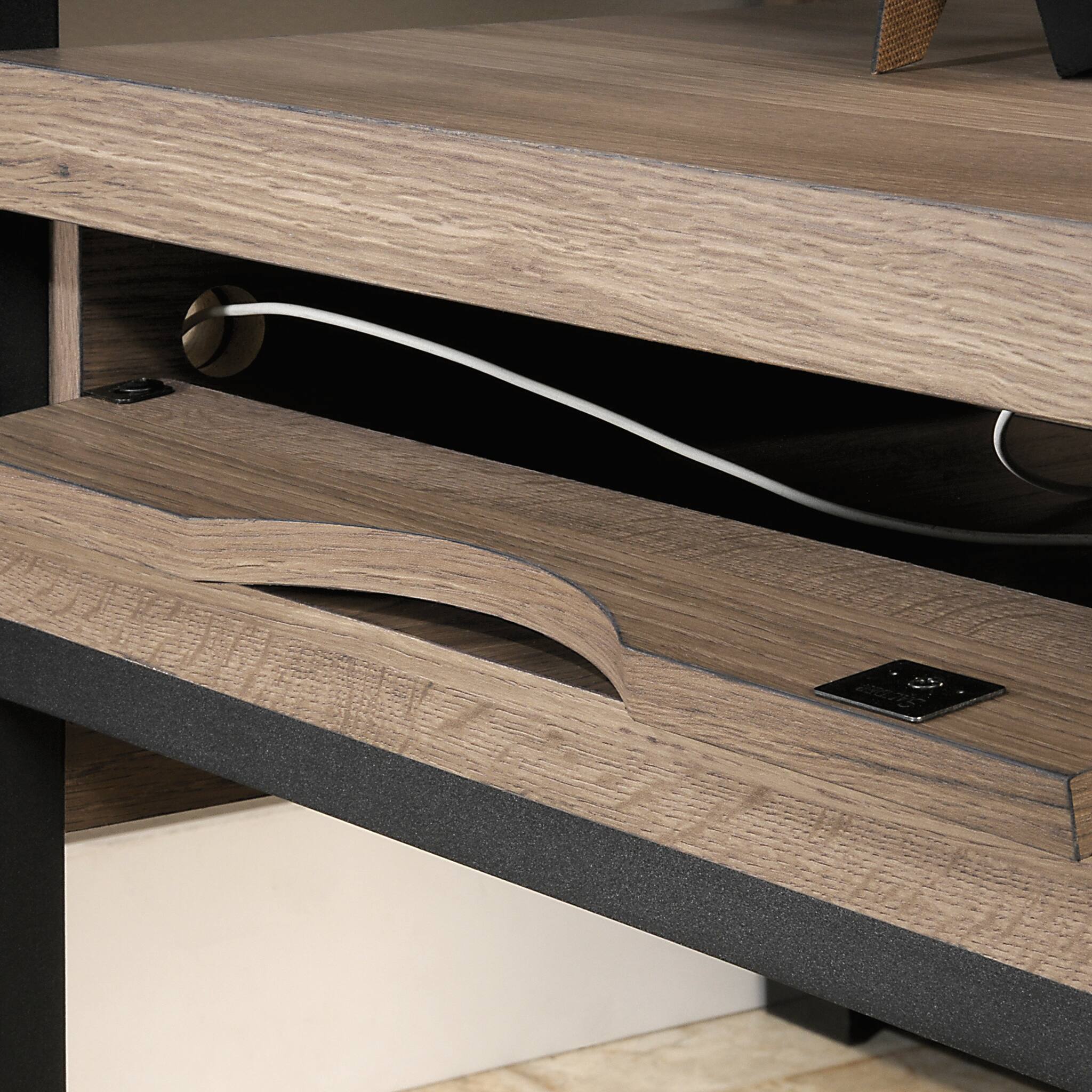 Angle. TinyHomie - L-Shaped Desk Brown finish - Brown.