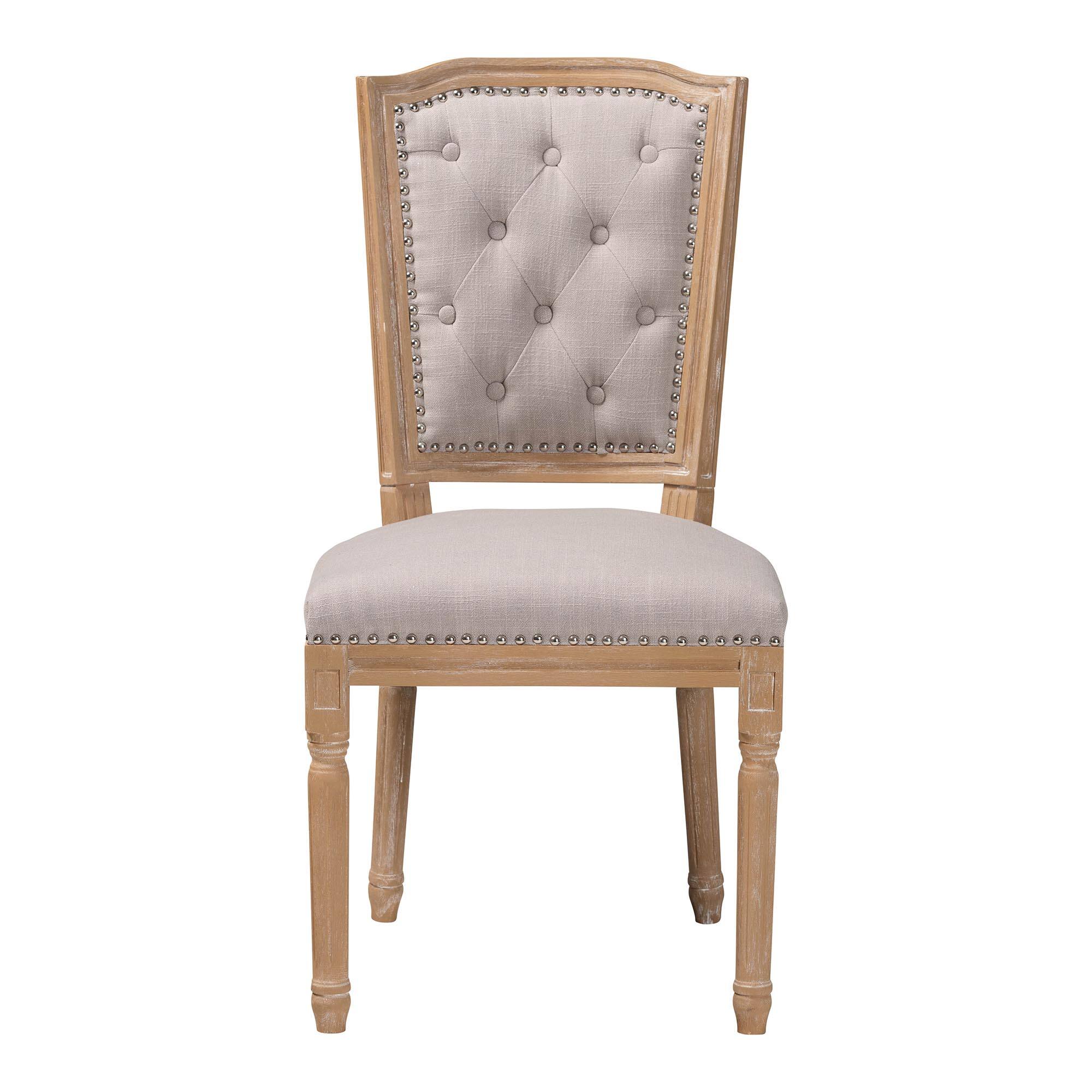 Angle. Baxton Studio - Estelle French Country Cottage Weathered Oak Fabric Button-tufted Upholstered Dining Chair - Beige.
