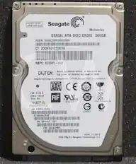 2262121029-0- DO NOT COVER BREATHER HOLE Seagate Momentus SERIAL ATA DISC DRIVE 500GB WWN: 5000C5005B8EDB9F CT: 2DDKF01333R76L NBPC: 623985 I 002 Avoid excessive shock; do not push on CAUTION: top cover or remove any seal or label. Seagate Technology Int'l, Koolhovenlaan 1 1119 NB Schiphol-Rijk Rijk, The Netherlands SERIAL a CE TUV 90 + 5V 0.70 A Date: 13223 Site: SU AF LR 20 US E190397 STX- Momentus (8) Product-of China SN: 6WR2LWWD D33027 N176 ST9500423AS PN: 9RT143-02 FW: 0004HPM1 DOM: 11/2012 HDD Mfg by Seagate Technology LLC