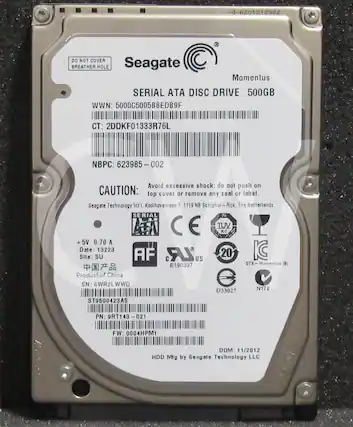2262121029-0- DO NOT COVER BREATHER HOLE Seagate Momentus SERIAL ATA DISC DRIVE 500GB WWN: 5000C5005B8EDB9F CT: 2DDKF01333R76L NBPC: 623985 I 002 Avoid excessive shock; do not push on CAUTION: top cover or remove any seal or label. Seagate Technology Int'l, Koolhovenlaan 1 1119 NB Schiphol-Rijk Rijk, The Netherlands SERIAL a CE TUV 90 + 5V 0.70 A Date: 13223 Site: SU AF LR 20 US E190397 STX- Momentus (8) Product-of China SN: 6WR2LWWD D33027 N176 ST9500423AS PN: 9RT143-02 FW: 0004HPM1 DOM: 11/2012 HDD Mfg by Seagate Technology LLC