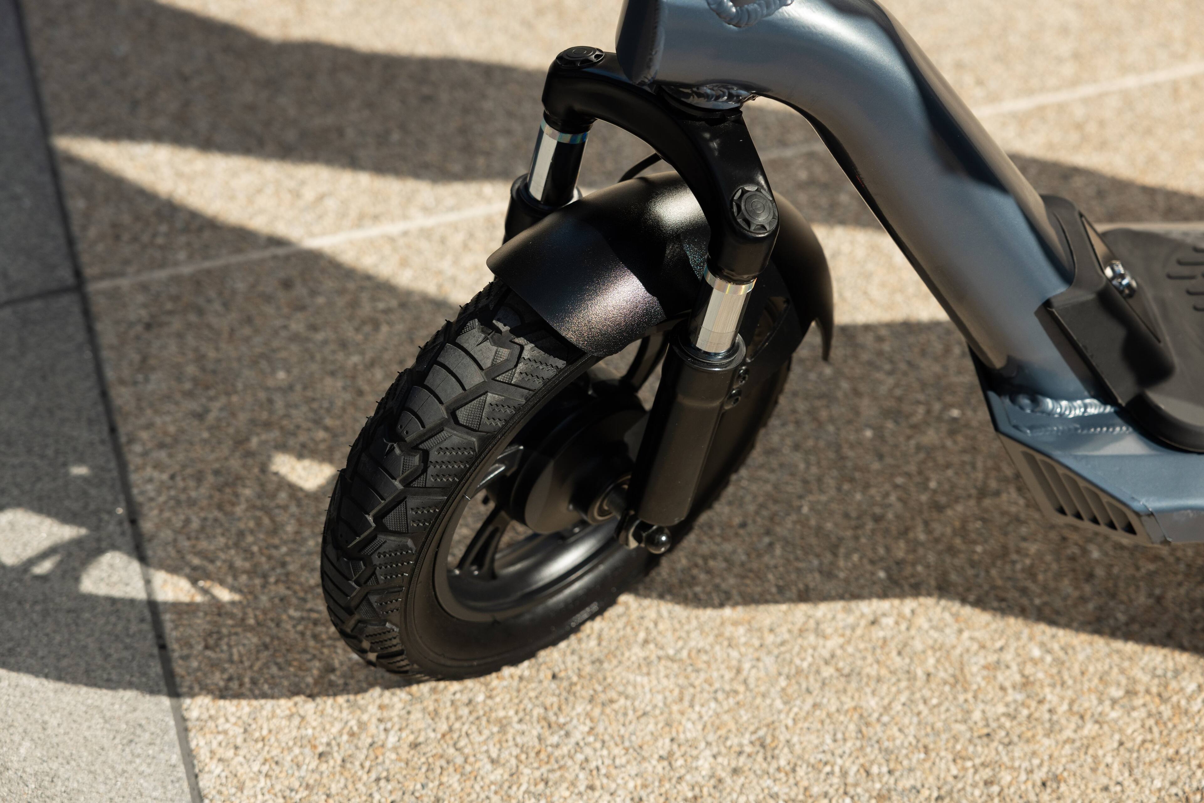 Left. MIHOVER - Adult Electric Scooter, 700W Motor, 12-Inch Pneumatic Tires, Front Suspension, Removable Battery, 20 MPH, 20-Mile Range - Yellow.