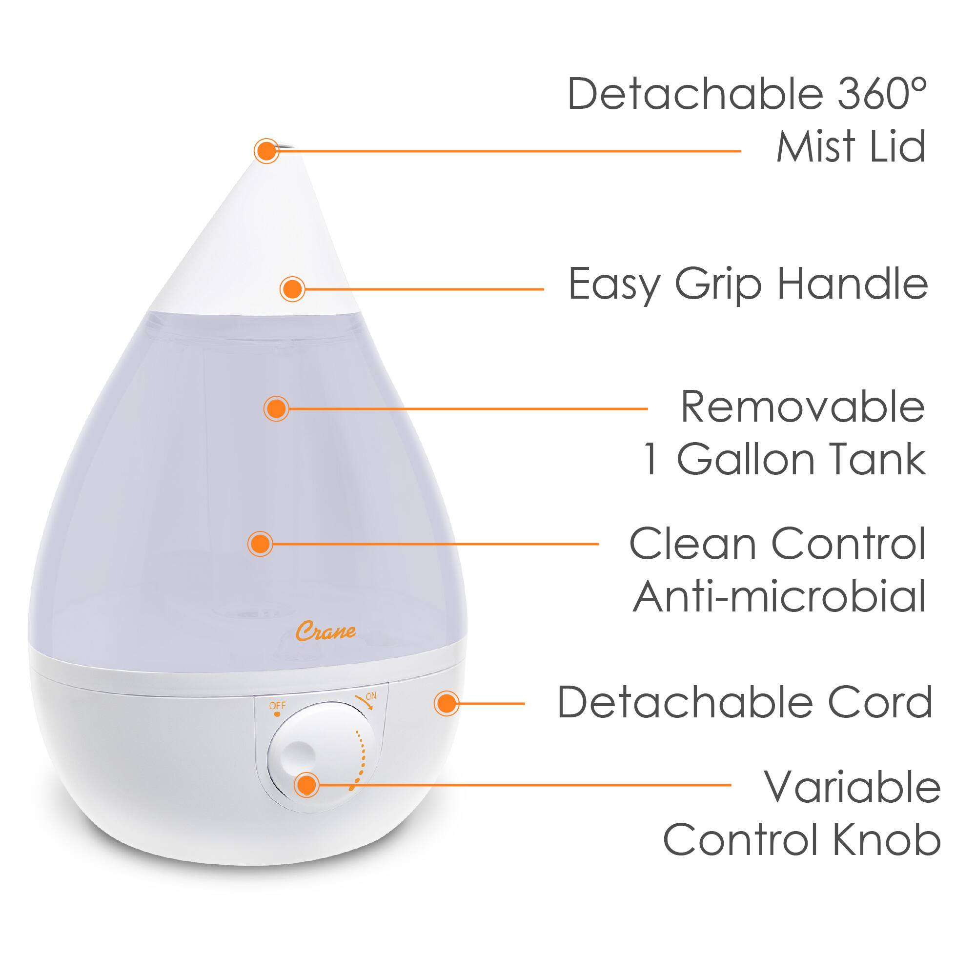 The image features a close-up view of a white air purifier with a detachable cord. The air purifier has a 360-degree mist lid, an easy grip handle, and a removable 1-gallon tank. It also has a crane clean control and an anti-microbial feature. The air purifier is equipped with a variable control knob, making it easy to adjust the settings according to the user's preferences.
