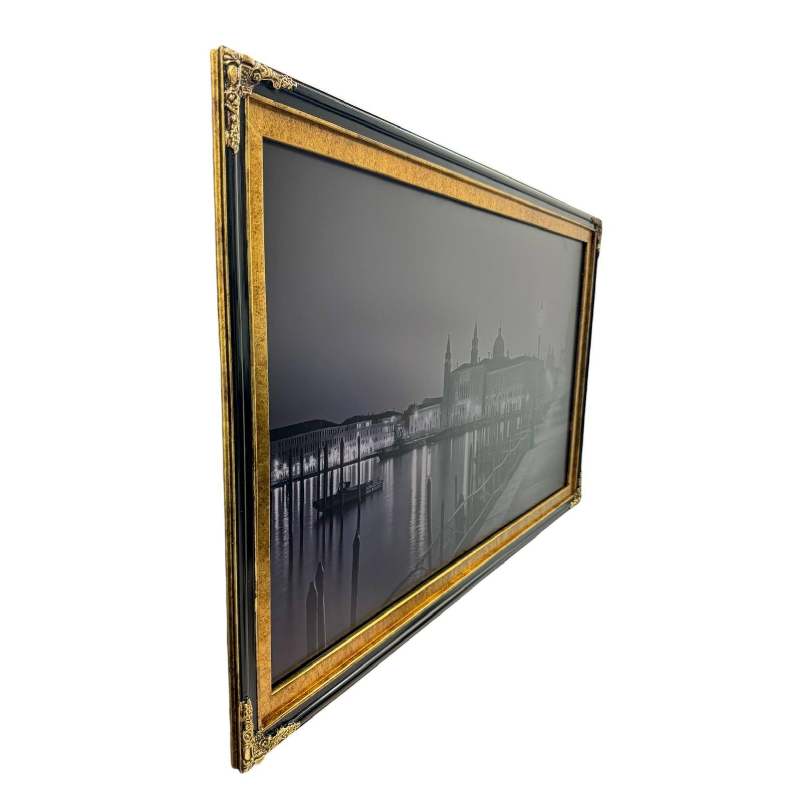 Angle. LAREDO FRAME FACTORY - 55 inch Hisense Canvas TV Ornate frame, Canvas TV by Hisense - GLOSSY BLACK WITH GOLD LEAF.