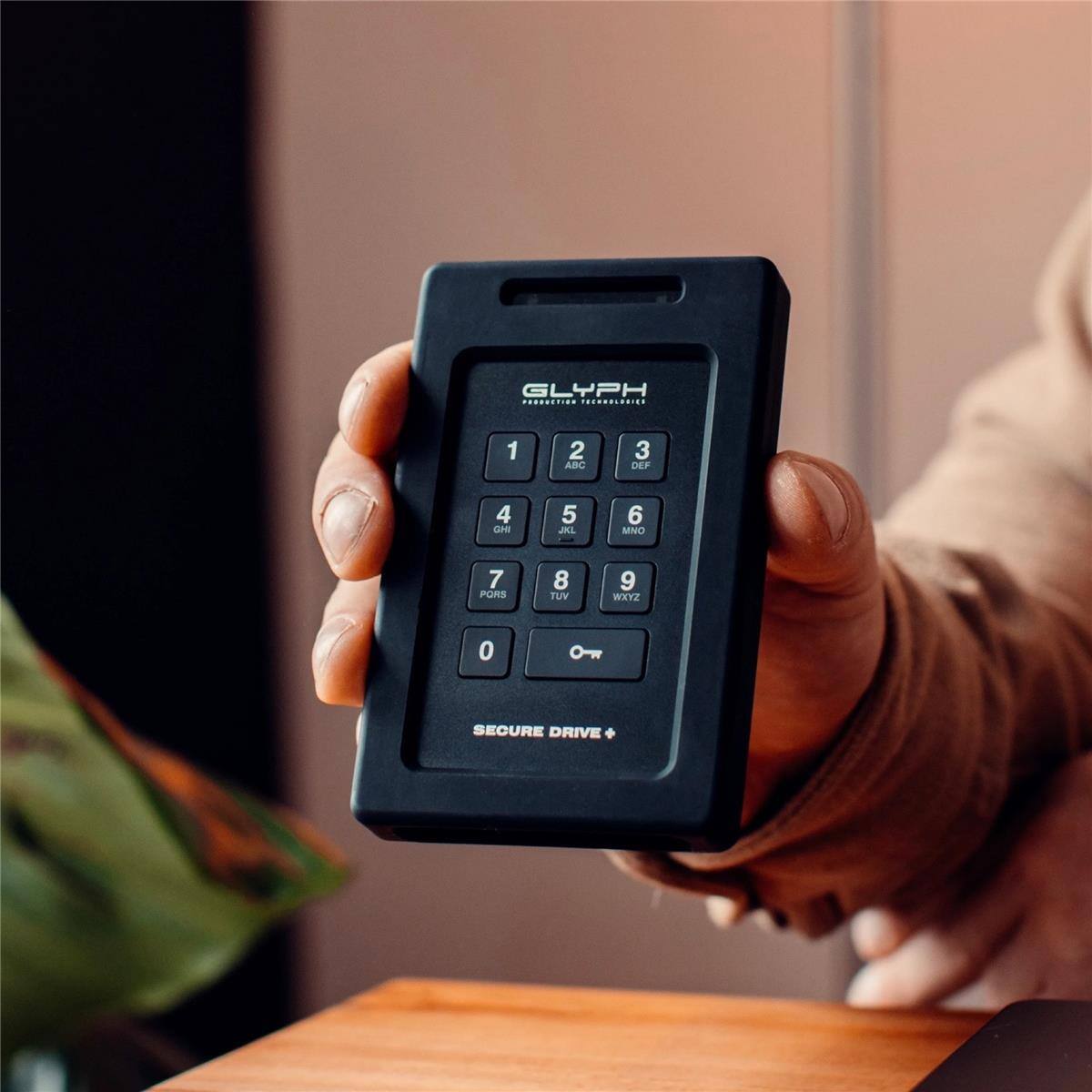 GLYPH PRODUCTION TECHNOLOGIES
1
2 ABC
3 DEF
4 GHI
5 JKL
6 MNO
7 PQRS
8 TUV
9 WXYZ
0
SECURE DRIVE +