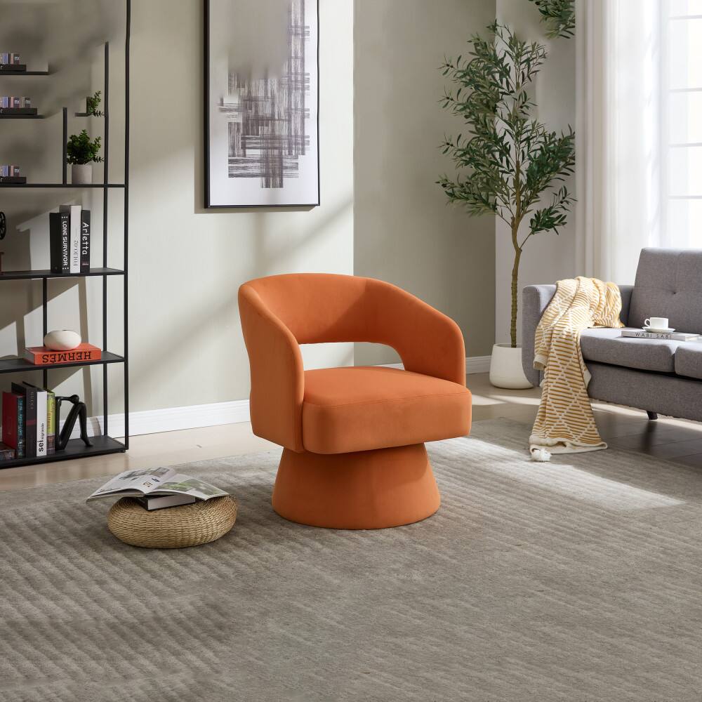 F H : -.. LONESURVIVOR 2 Arletta - BATRT1 HERMES NPTET ..5S Sel-- | $

The image shows a modern living room with a bright orange chair, a bookshelf with books including "Arletta" and "FREEMEN," and a gray sofa with a throw blanket. There is also a framed abstract art piece on the wall and a small plant.