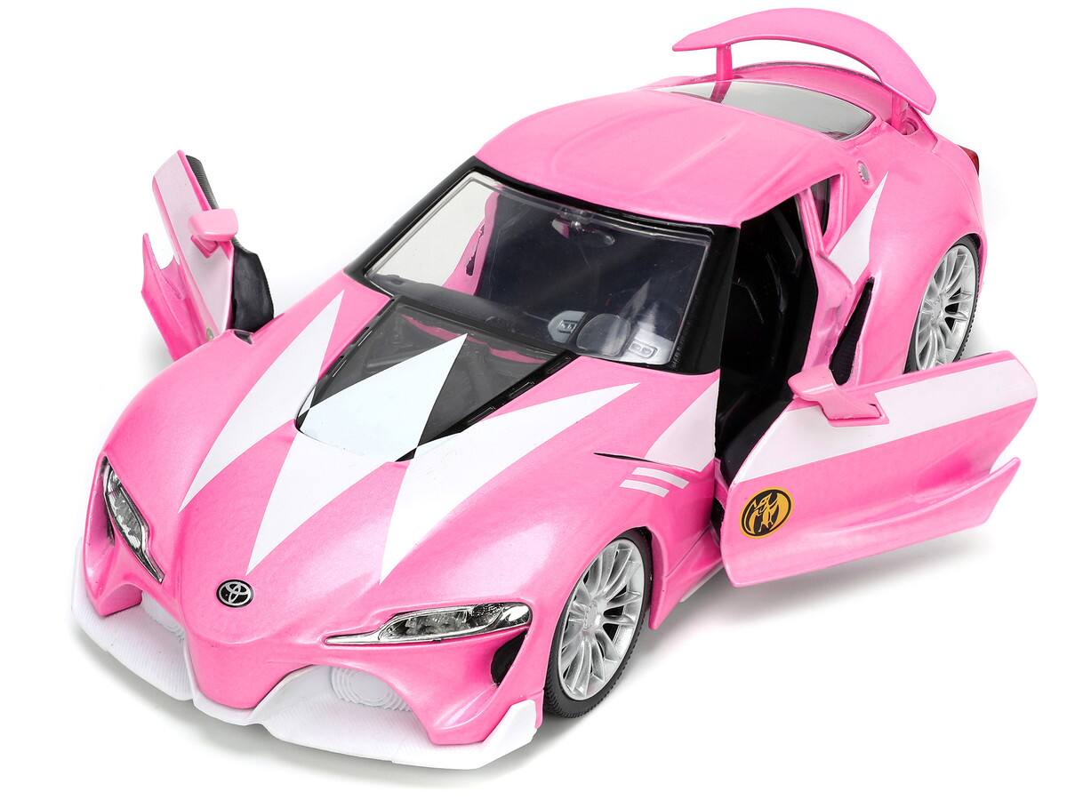 Angle. Jada - Toyota FT-1 Concept Pink Metallic and Pink Ranger Diecast Figurine "Power Rangers" "Hollywood Rides" Series 1/24 - Pink Metallic.