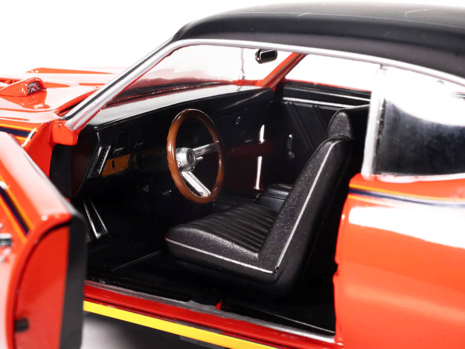 Alt View 3. Autoworld - 1969 Pontiac GTO Judge Carousel Red with Black Stripes and Black Vinyl Top "Mecum Auctions" 1/18 Model Car by Auto World.