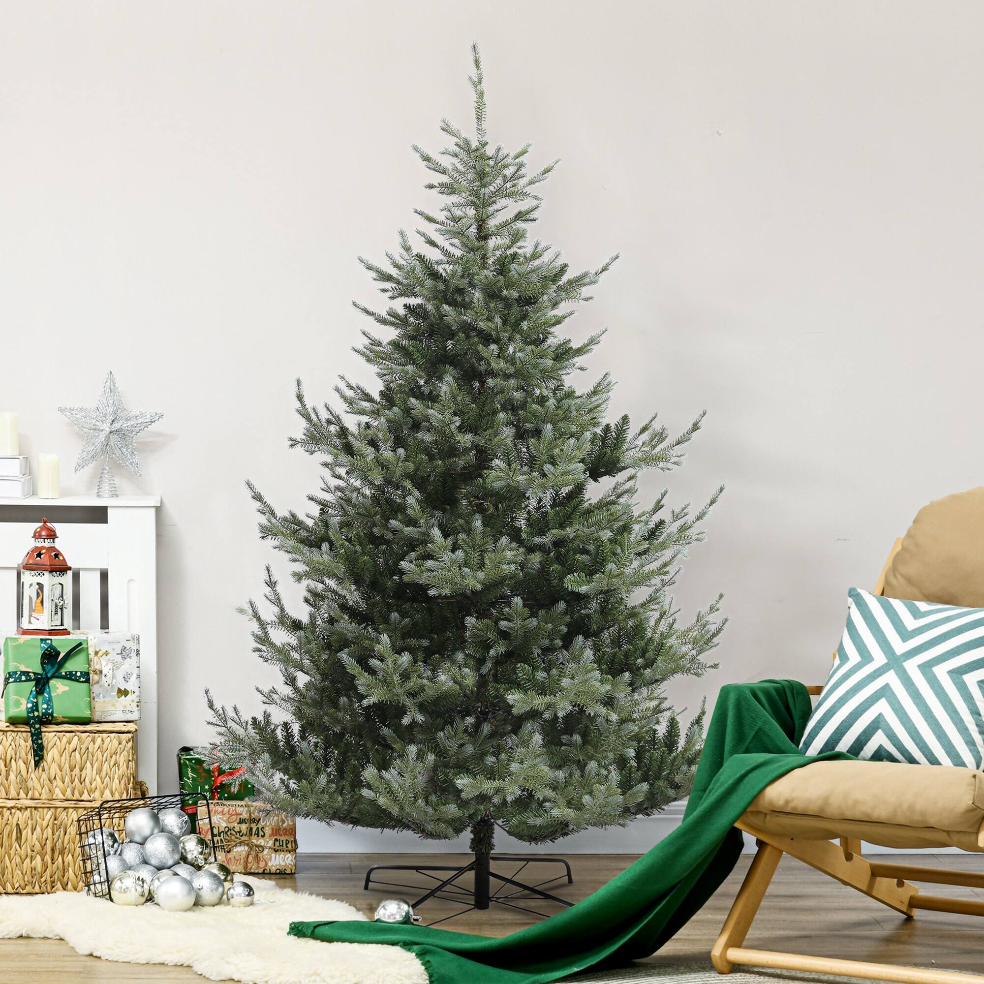 A Christmas tree with gifts and decorations.
