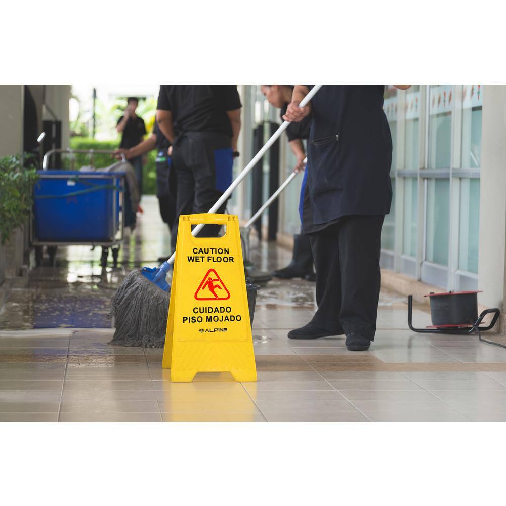 T E CAUTION WET FLOOR CUIDADO PISO MOJADO ALPINE