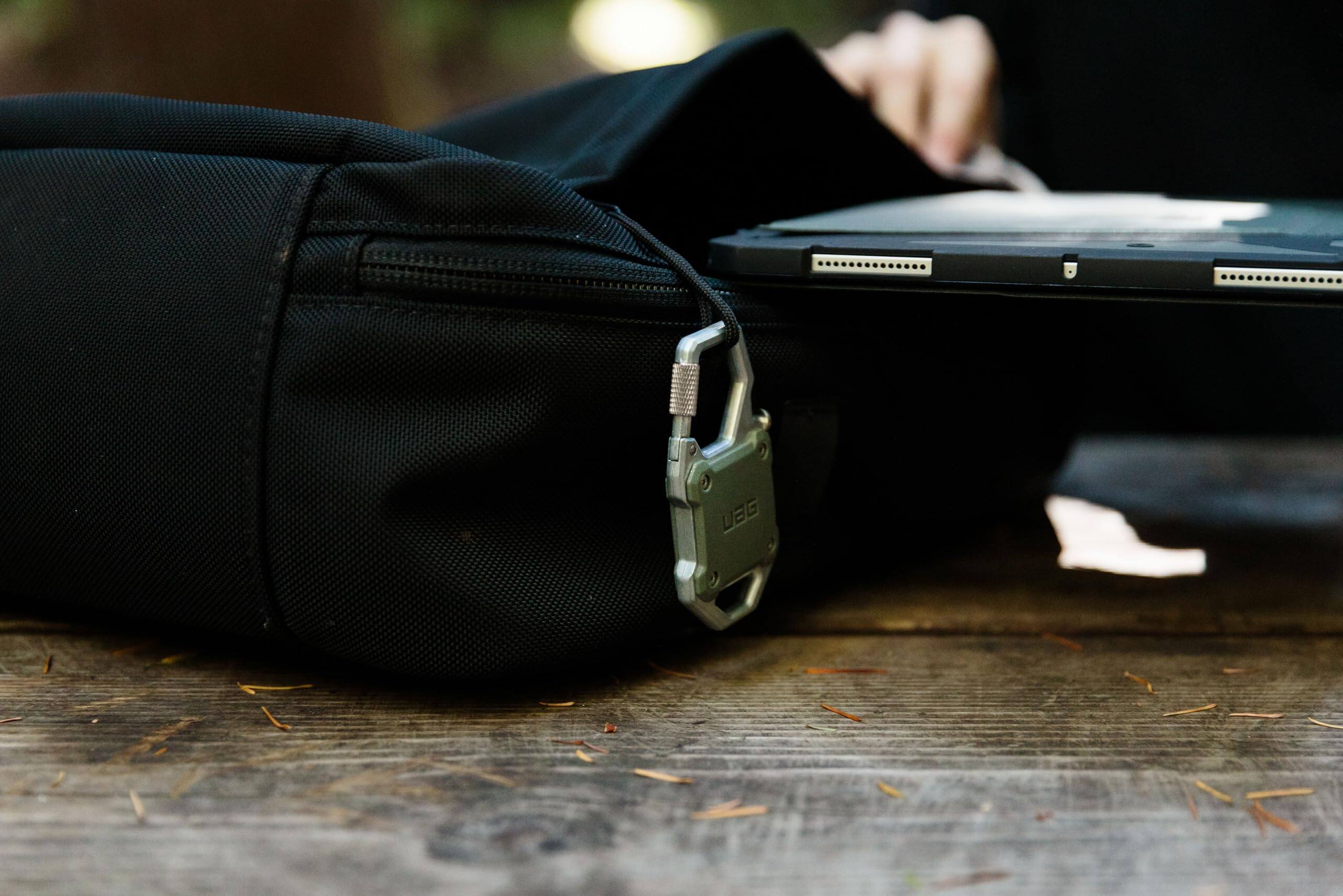 Alt View 1. UAG - AirTag Case w Built-in Bottle Opener & Carabiner for Keys, Luggage & Bags - Olive Drab/Silver.