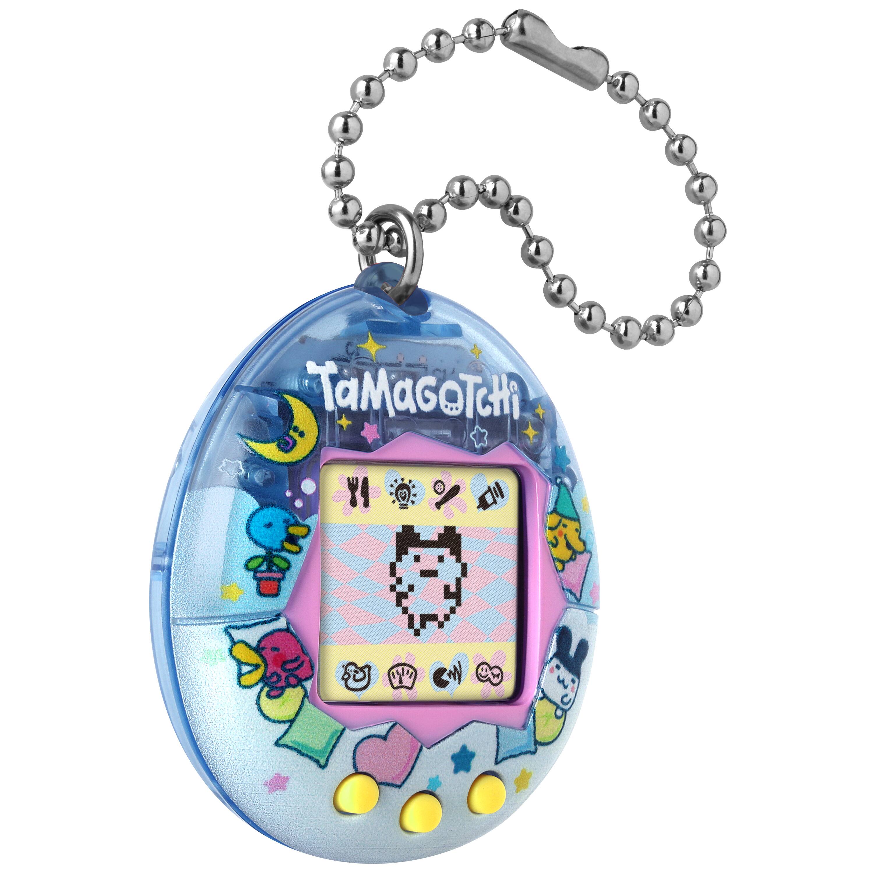 Left. Bandai - Original Tamagotchi - Tama Pajama.